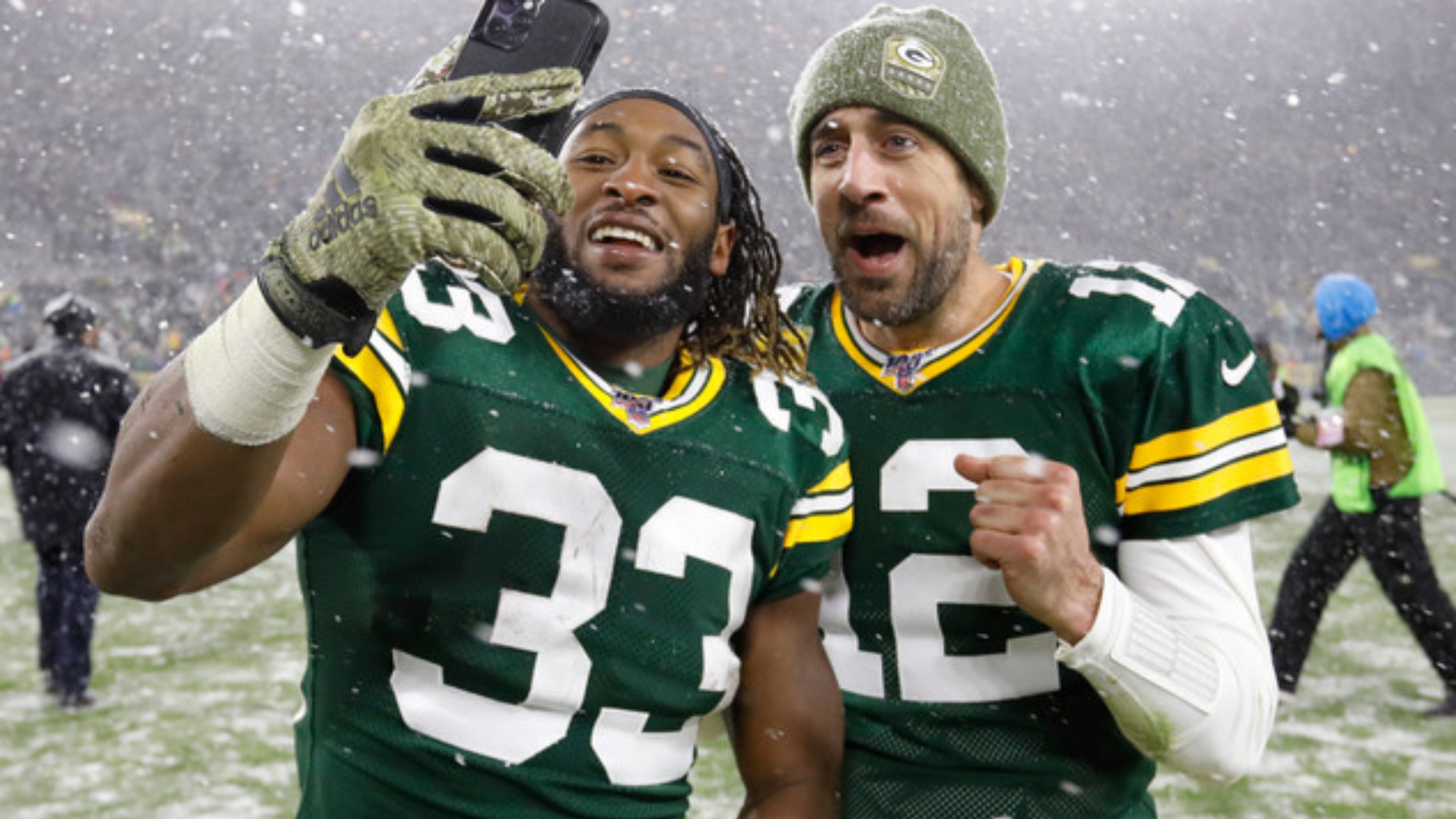 Jones and Aaron Rodgers take a selfie at snowy Lambeau Field after a victory over the Tennessee Titans