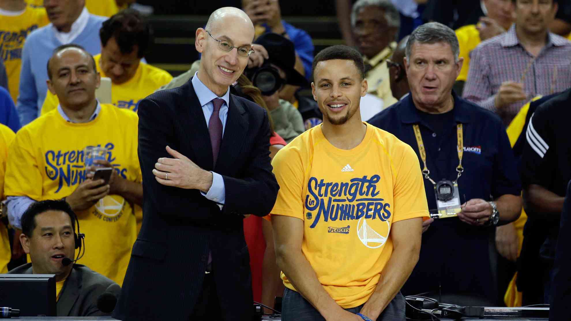 Adam Silver and Stephen Curry.