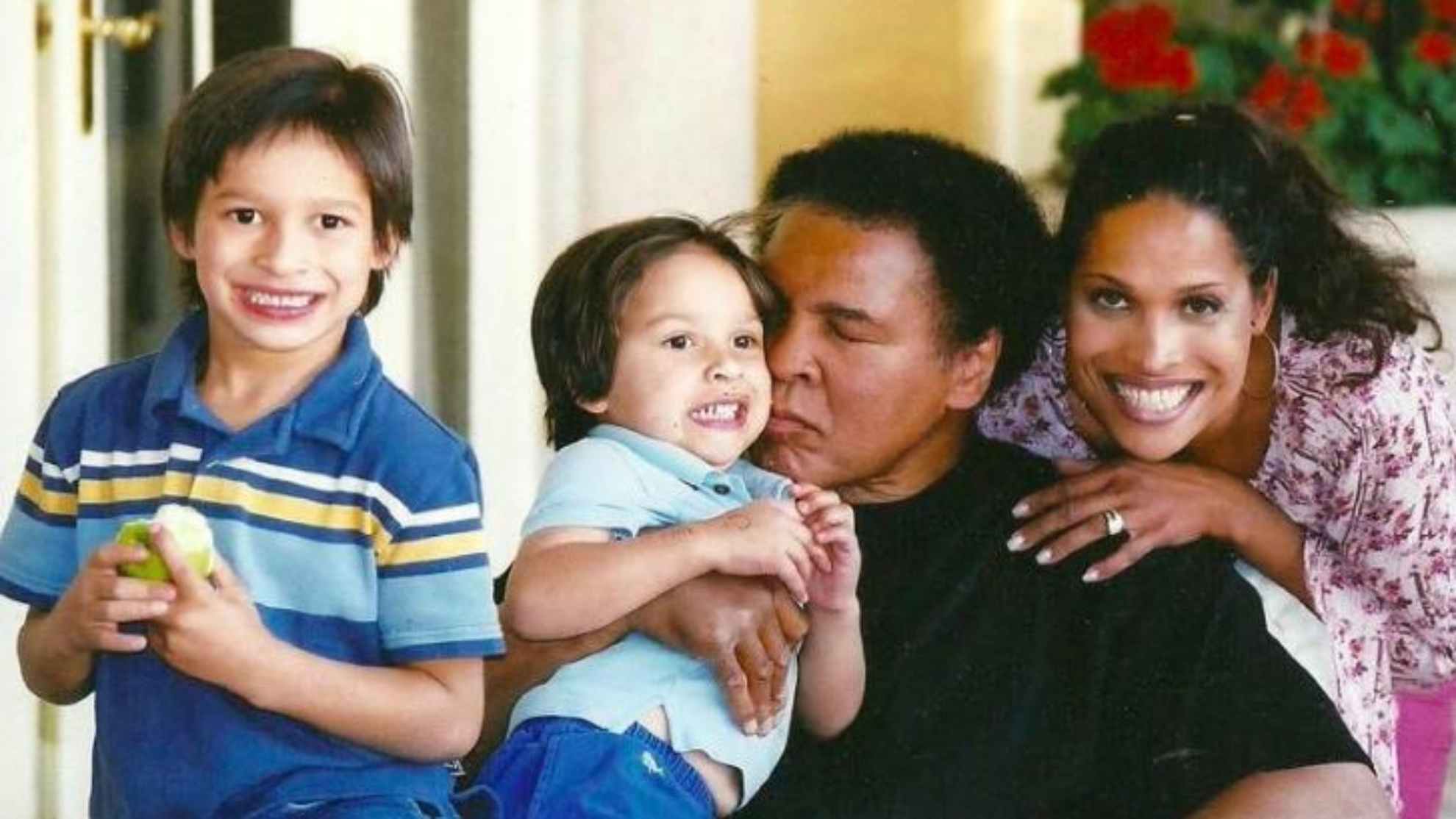 Muhammad Ali and his grandchildren and daughter.