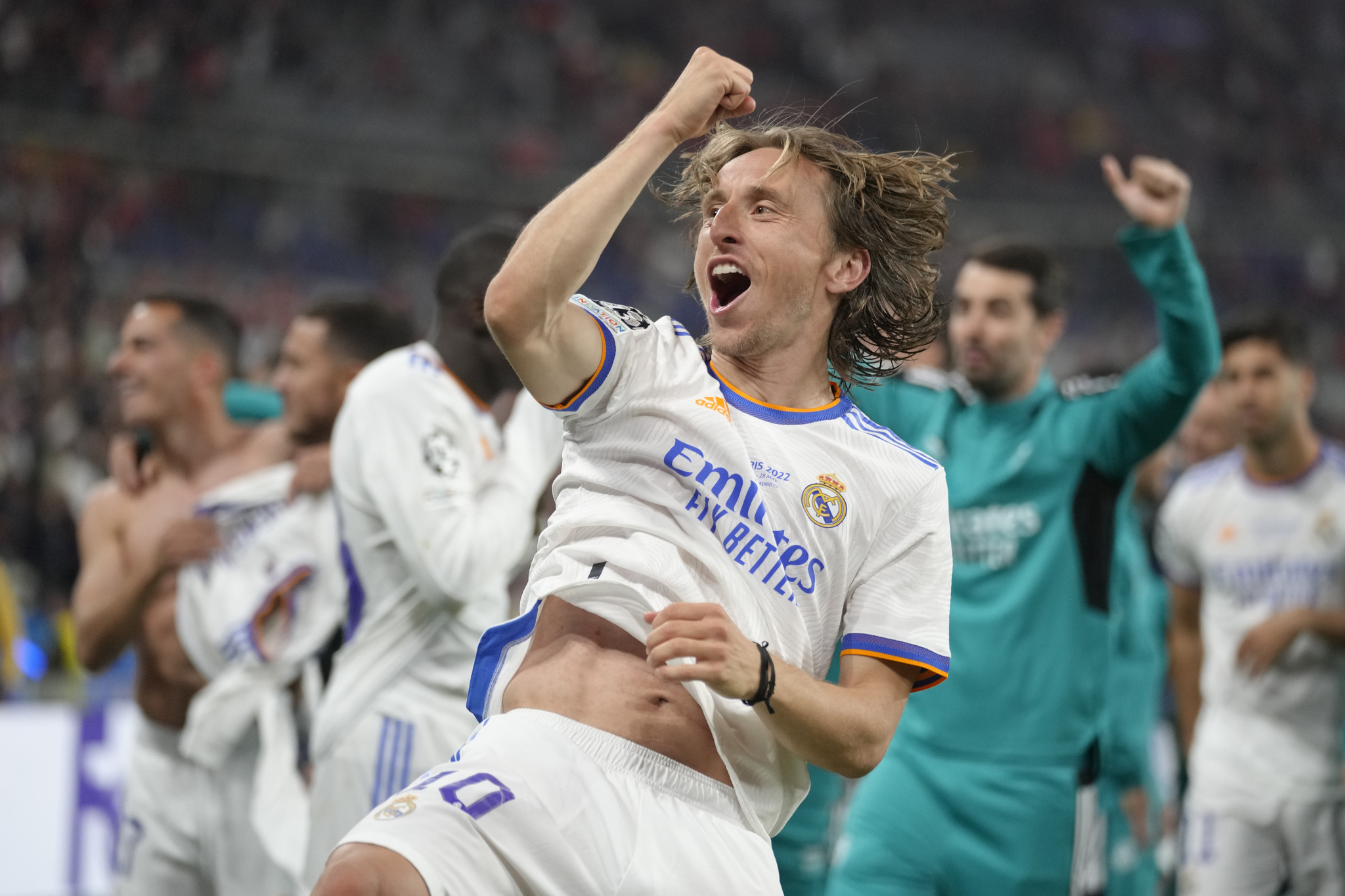 Real Madrid's Luka Modric celebrates winning the  lt;HIT gt;Champions lt;/HIT gt;  lt;HIT gt;League lt;/HIT gt; final soccer match between Liverpool and Real Madrid at the Stade de France in Saint Denis near Paris, Saturday, May 28, 2022. Real Madrid won 1-0. (AP Photo/Kirsty Wigglesworth)