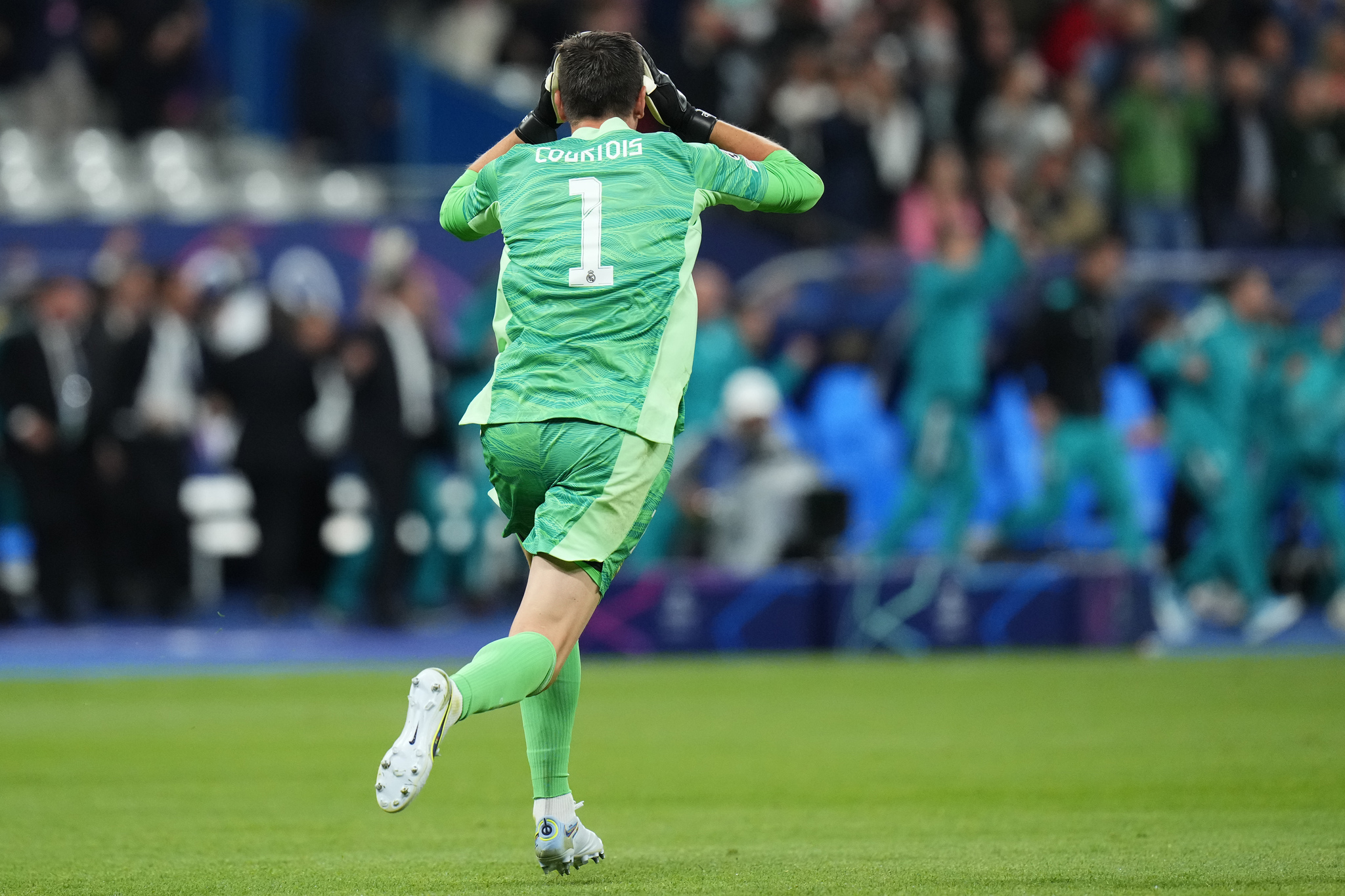 Real Madrid's goalkeeper Thibaut Courtois celebrates after the  lt;HIT gt;Champions lt;/HIT gt;  lt;HIT gt;League lt;/HIT gt; final soccer match between Liverpool and Real Madrid at the Stade de France in Saint Denis near Paris, Saturday, May 28, 2022. Real won 1-0. (AP Photo/Petr David Josek)