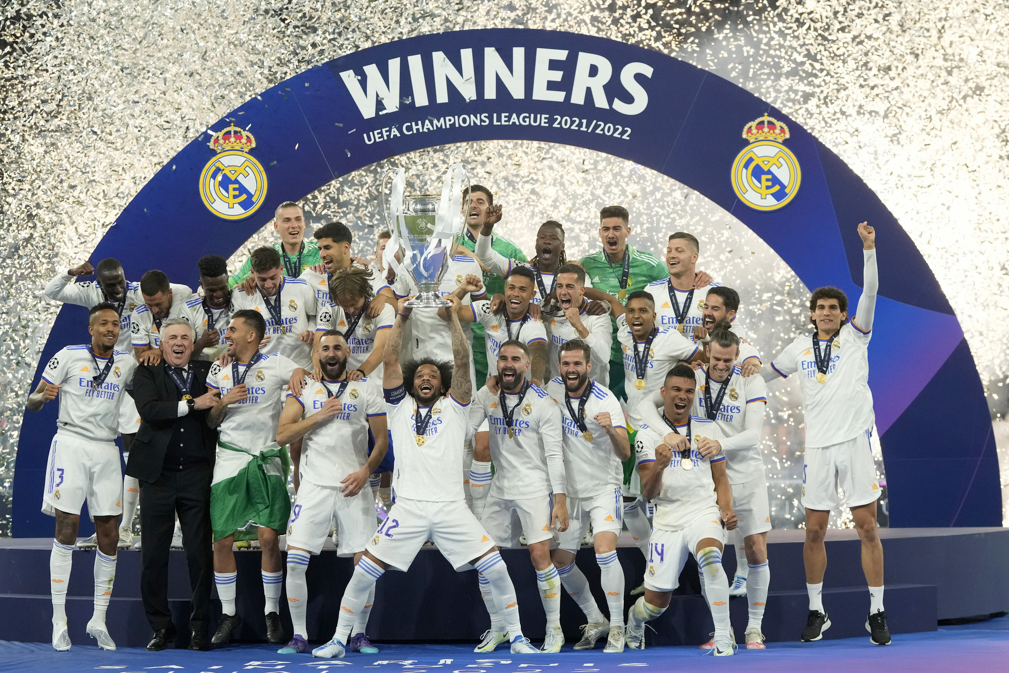 Real Madrid's Marcelo lifts the trophy 