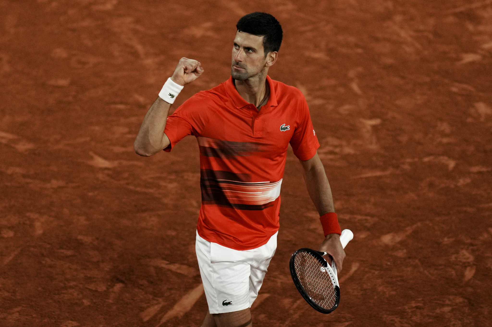 Serbia's Novak  lt;HIT gt;Djokovic lt;/HIT gt; celebrates winning the second set as he plays Spain's Rafael  lt;HIT gt;Nadal lt;/HIT gt; during their quarterfinal match of the French Open tennis tournament at the Roland Garros stadium Tuesday, May 31, 2022 in Paris. (AP Photo/Thibault Camus)