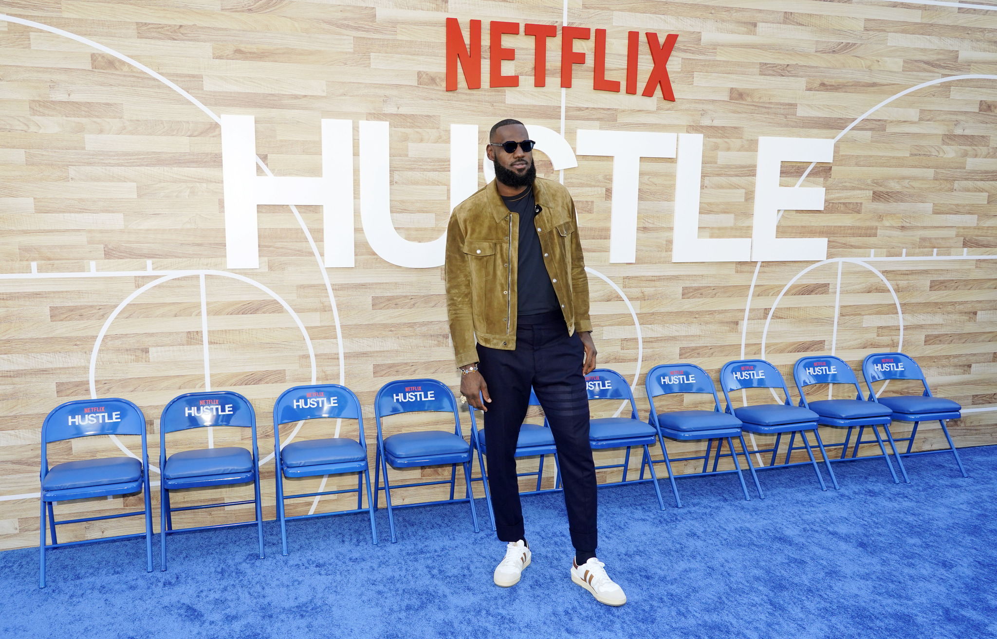 NBA basketball player  lt;HIT gt;LeBron lt;/HIT gt;  lt;HIT gt;James lt;/HIT gt;, a producer of the Netflix film "Hustle," poses at the premiere of the film, Wednesday, June 1, 2022, at the Regency Village Theatre in Los Angeles. (AP Photo/Chris Pizzello)