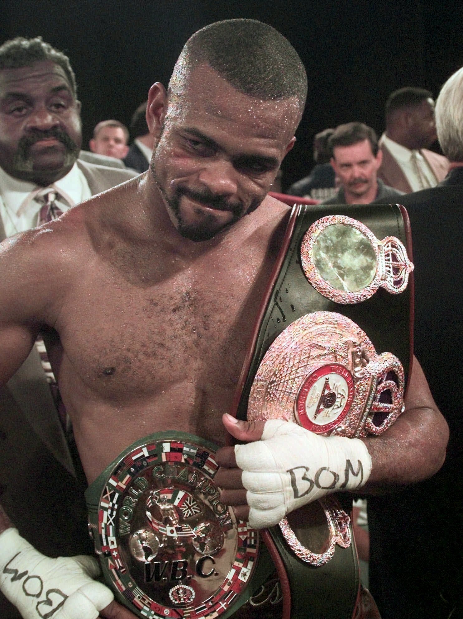 World Boxing Commission light heavyweight champion Roy Jones Jr. holds two belts.