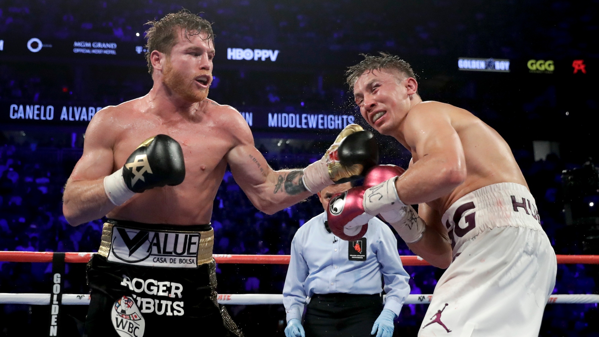 Canelo Alvarez lands a punch against Gennady Golovkin in the 12th round during a middleweight title boxing match, on Sept. 15, 2018, in Las Vegas
