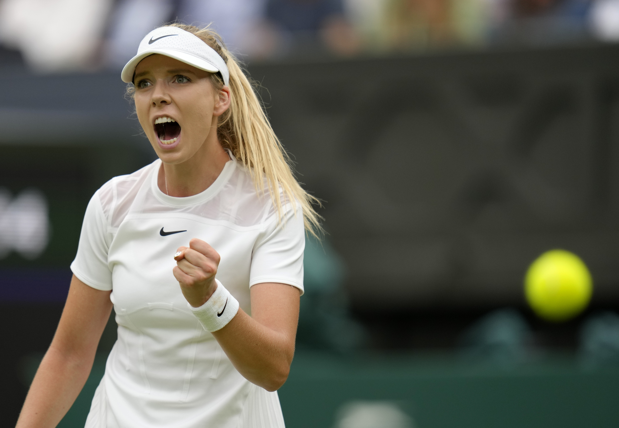 Britain's Katie  lt;HIT gt;Boulter lt;/HIT gt; celebrates after winning a point against Karolina Pliskova of the Czech Republic in a second round women's singles match on day four of the Wimbledon tennis championships in London, Thursday, June 30, 2022. (AP Photo/Kirsty Wigglesworth)