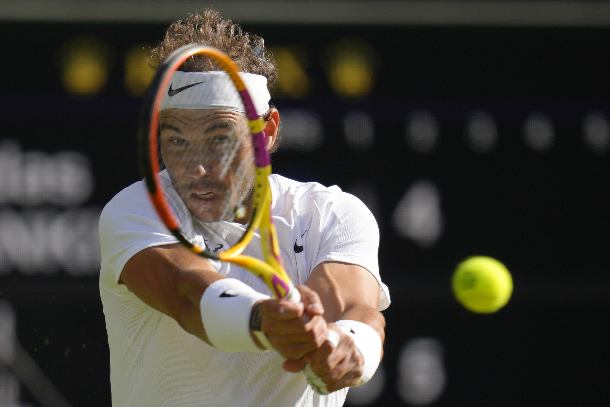 Spain's Rafael  lt;HIT gt;Nadal lt;/HIT gt; returns to Lithuania's Ricardas Berankis in a second round men's singles match on day four of the Wimbledon tennis championships in London, Thursday, June 30, 2022. (AP Photo/Kirsty Wigglesworth)