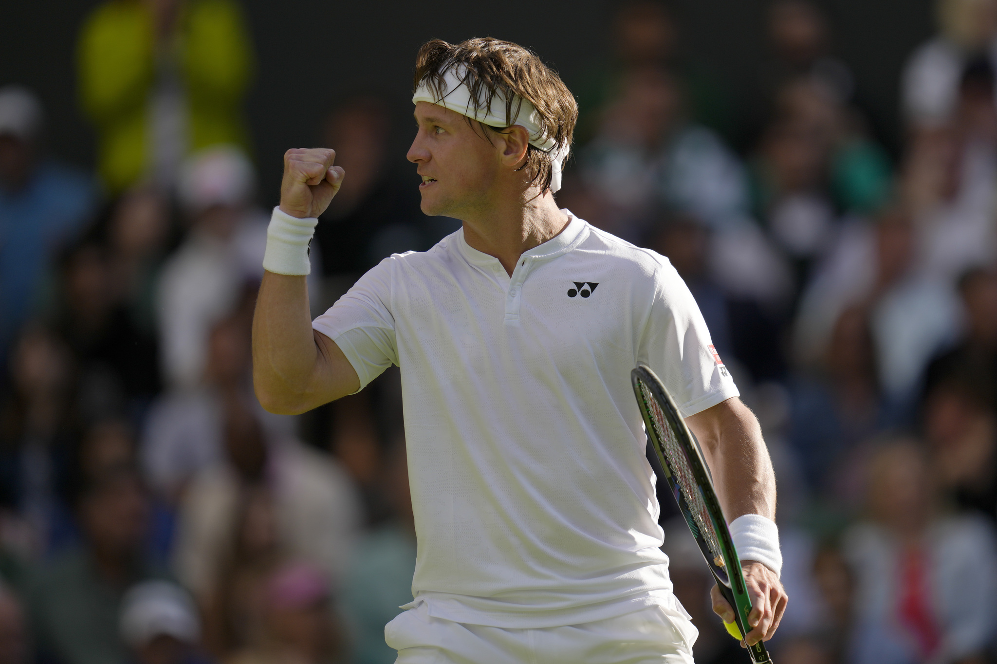 Lithuania's Ricardas  lt;HIT gt;Berankis lt;/HIT gt; celebrates winning the third set against Spain's Rafael Nadal in a second round men's singles match on day four of the Wimbledon tennis championships in London, Thursday, June 30, 2022. (AP Photo/Kirsty Wigglesworth)