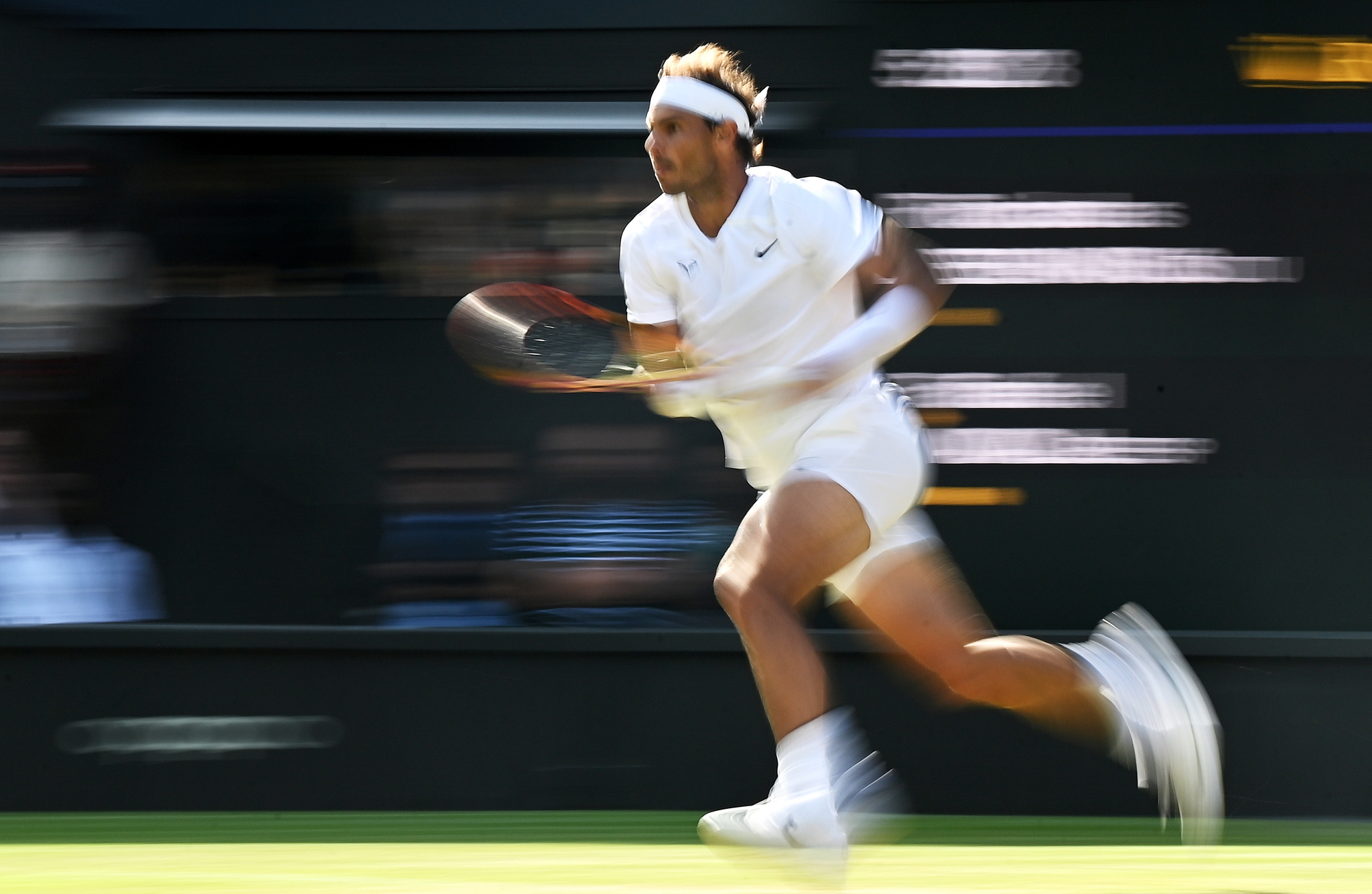 Wimbledon (United Kingdom), 30/06/2022.- Rafael  lt;HIT gt;Nadal lt;/HIT gt; of Spain in action in the men's second round match against Ricardas Berankis of Lithuania at the Wimbledon Championships, in Wimbledon, Britain, 30 June 2022. (Tenis, Lituania, España, Reino Unido) EFE/EPA/NEIL HALL EDITORIAL USE ONLY