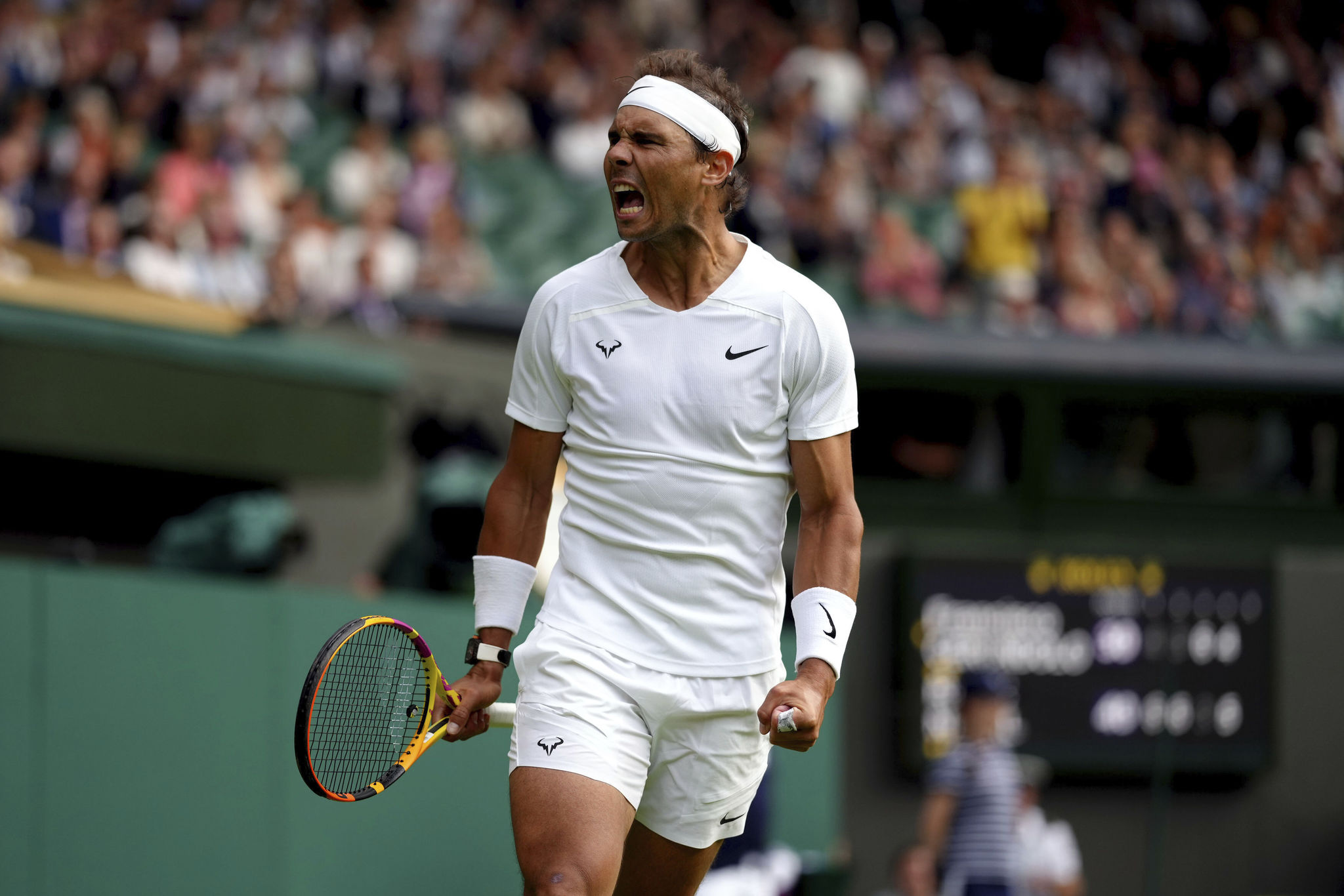 Spain's Rafael  lt;HIT gt;Nadal lt;/HIT gt; celebrates beating Argentina's Francisco Cerundolo in a first round men's singles match on day two of the Wimbledon tennis championships in London, Tuesday, June 28, 2022. (John Walton/PA via AP)