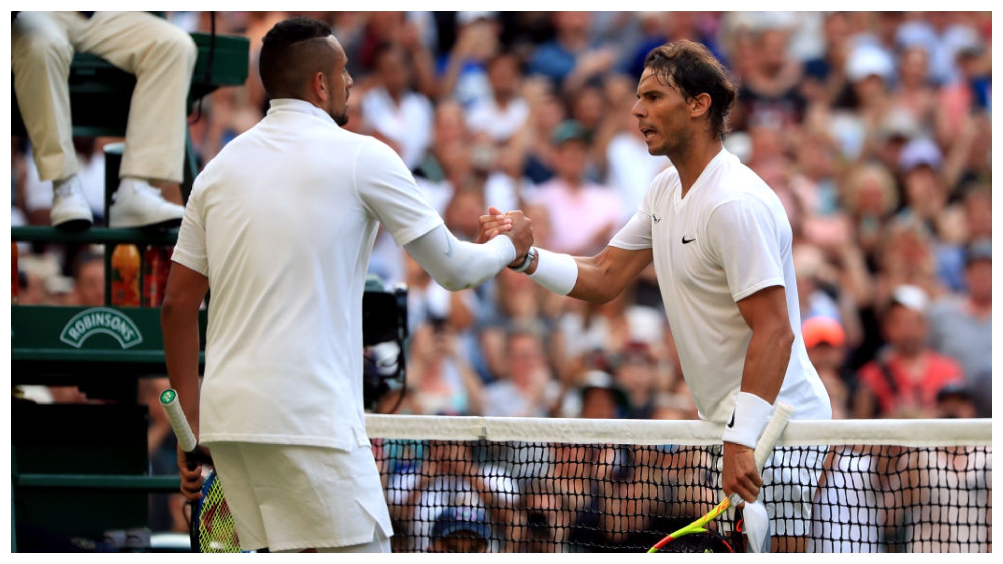 Kyrgios and Nadal at the Wimbledon net