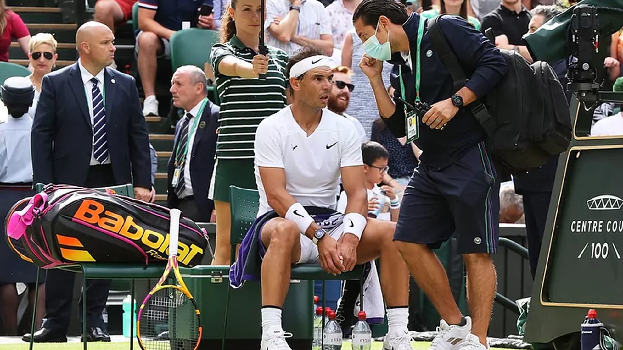 Nadal gets treatment during his match vs Taylor Fritz