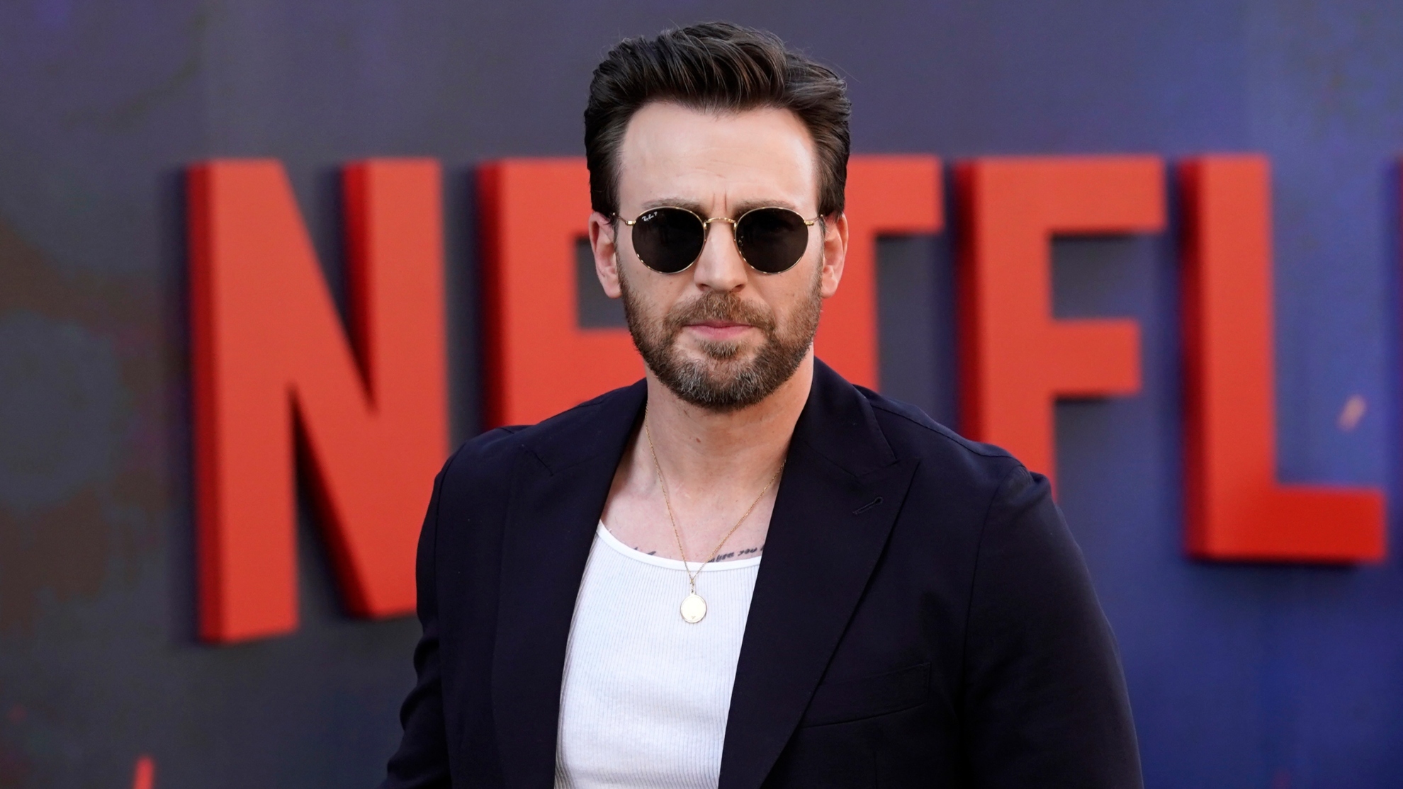Chris Evans arrives at the premiere of the Netflix film The Gray Man