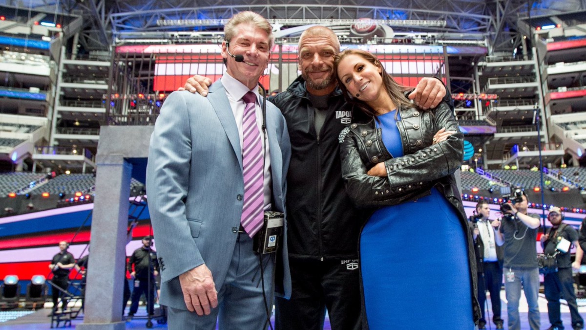 Vince McMahon with Stephanie McMahon and Triple H