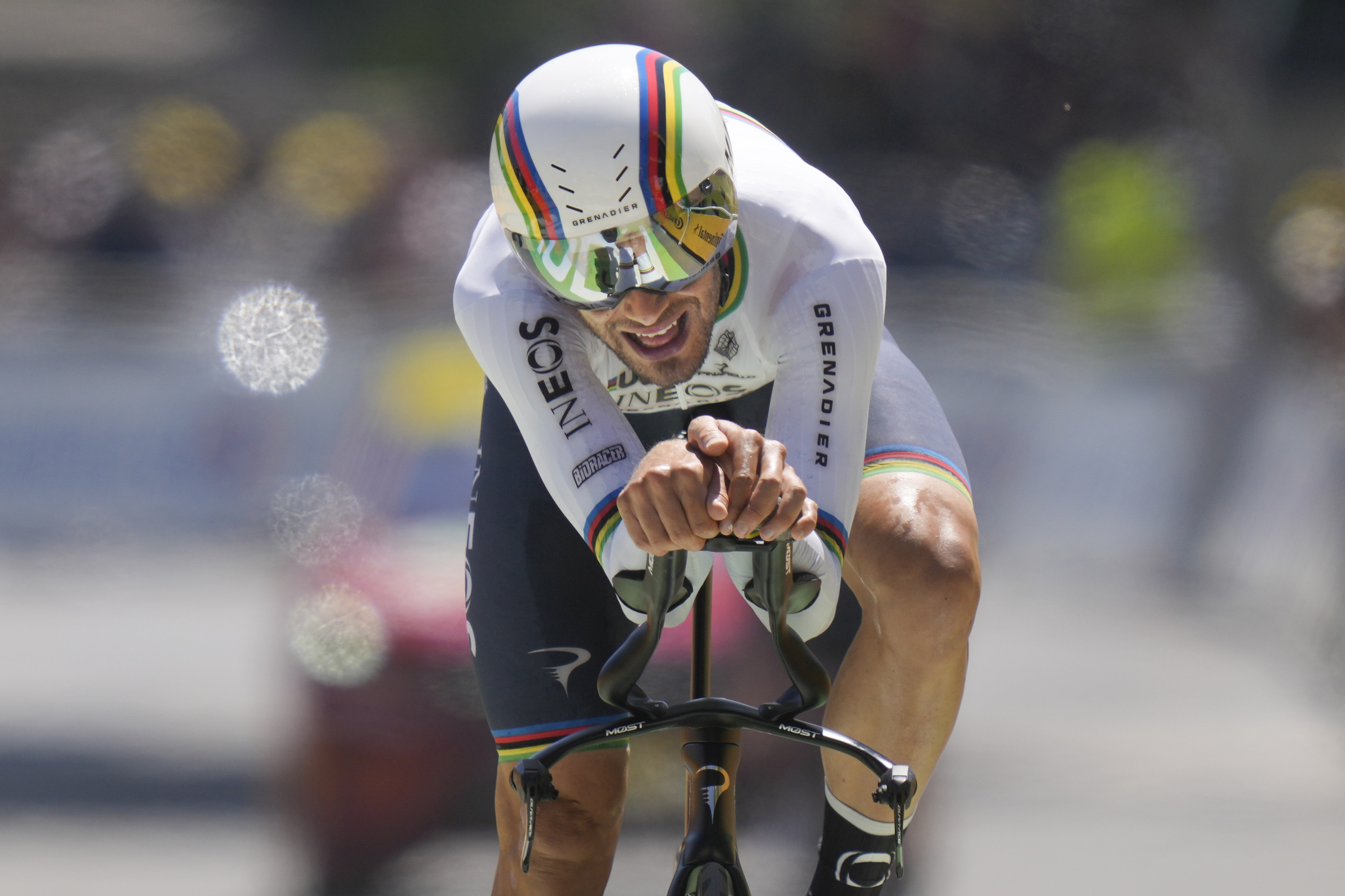 Italy's Filippo  lt;HIT gt;Ganna lt;/HIT gt; crosses the finish line during the twentieth stage of the Tour de France cycling race, an individual time trial over 40.7 kilometers (25.3 miles) with start in Lacapelle-Marival and finish in Rocamadour, France, Saturday, July 23, 2022. (AP Photo/Thibault Camus)