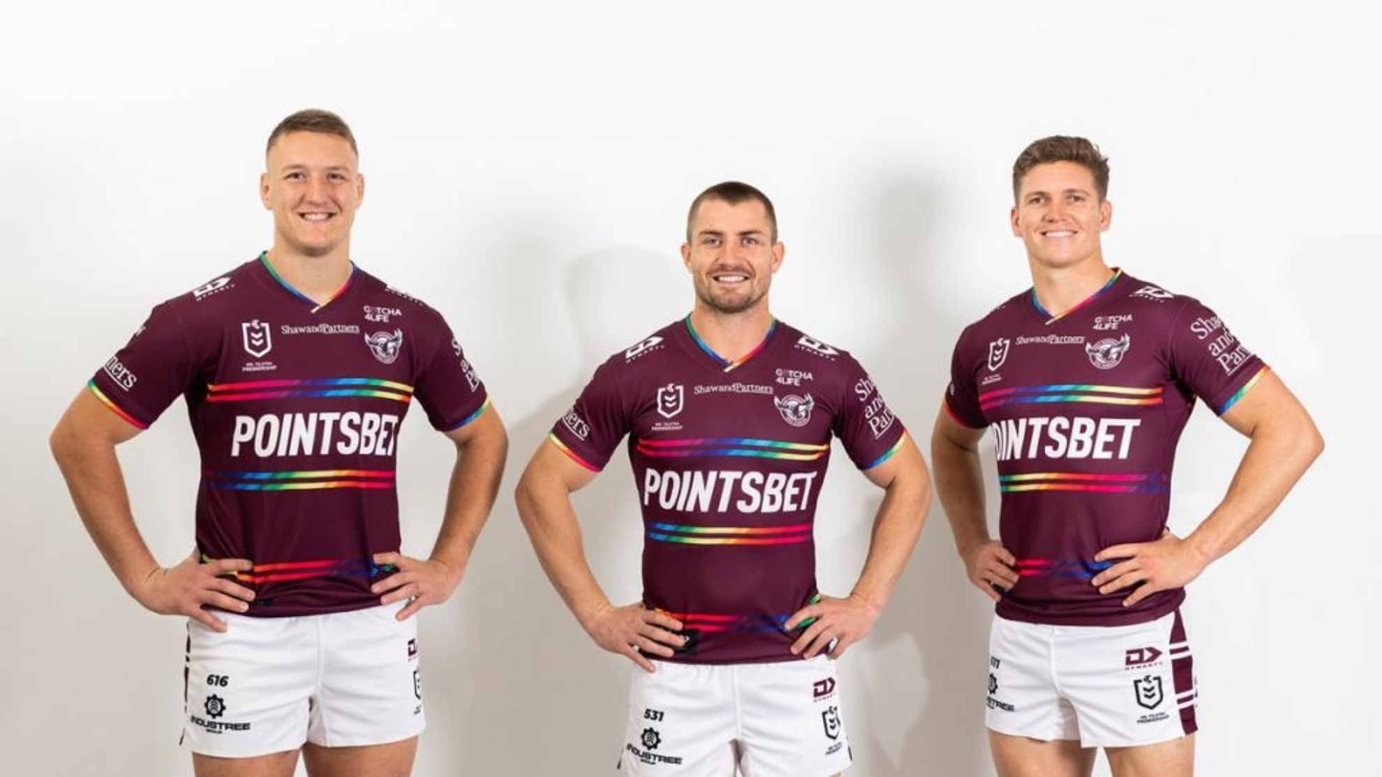 Three Manly Warringah Sea Eagles players during their jersey presentation.