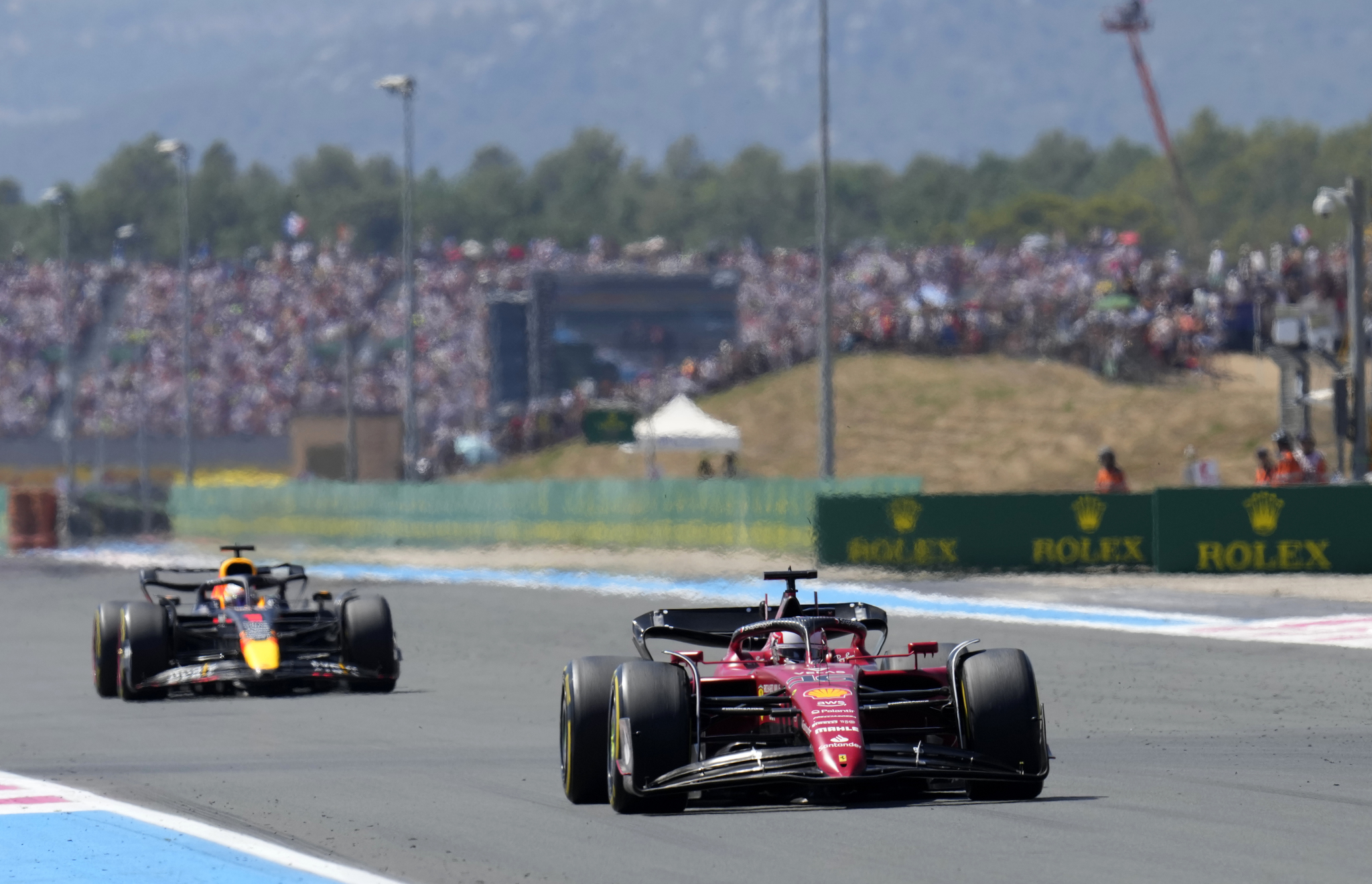 lt;HIT gt;Ferrari lt;/HIT gt; driver Charles Leclerc of Monaco steers his car followed by Red Bull driver Max Verstappen of the Netherlands during the French Formula One Grand Prix at Paul Ricard racetrack in Le Castellet, southern France, Sunday, July 24, 2022. (AP Photo/Manu Fernandez)