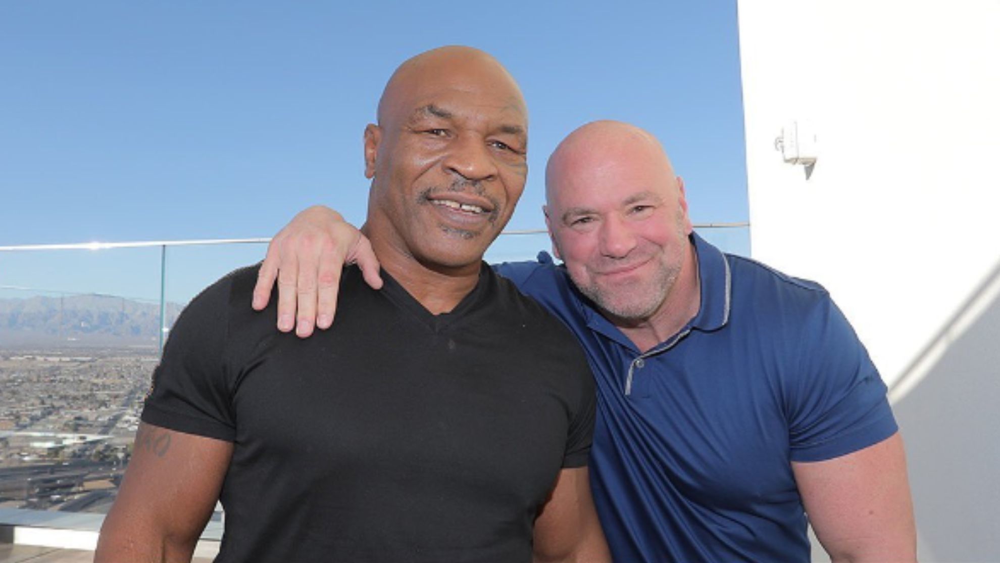 Mike Tyson (left) and Dana White (right)
