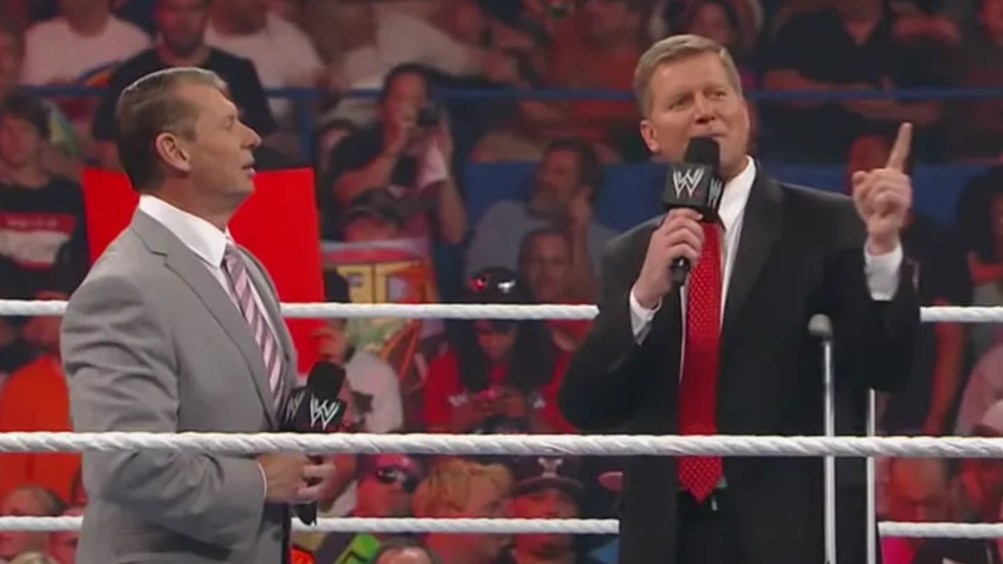 Vince McMahon (left) and John Laurinaitis (right)