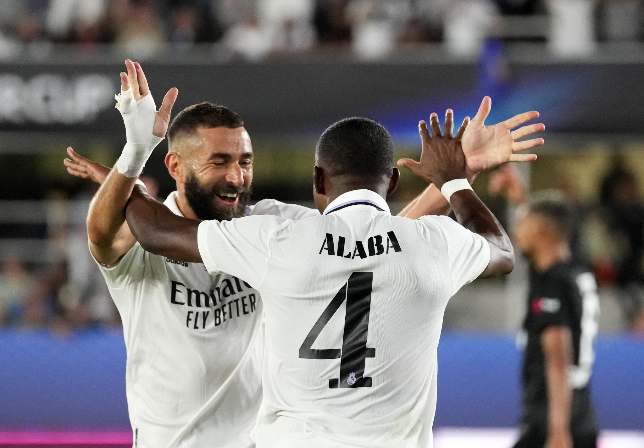 Real Madrid's David Alaba celebrates with Karim Benzema 