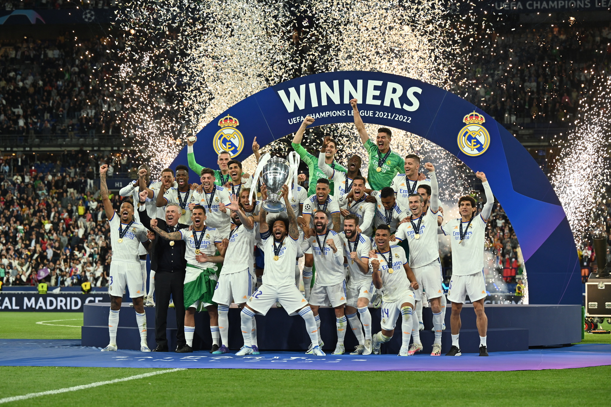 Real Madrid celebrate their 2021/22 Champions League win.