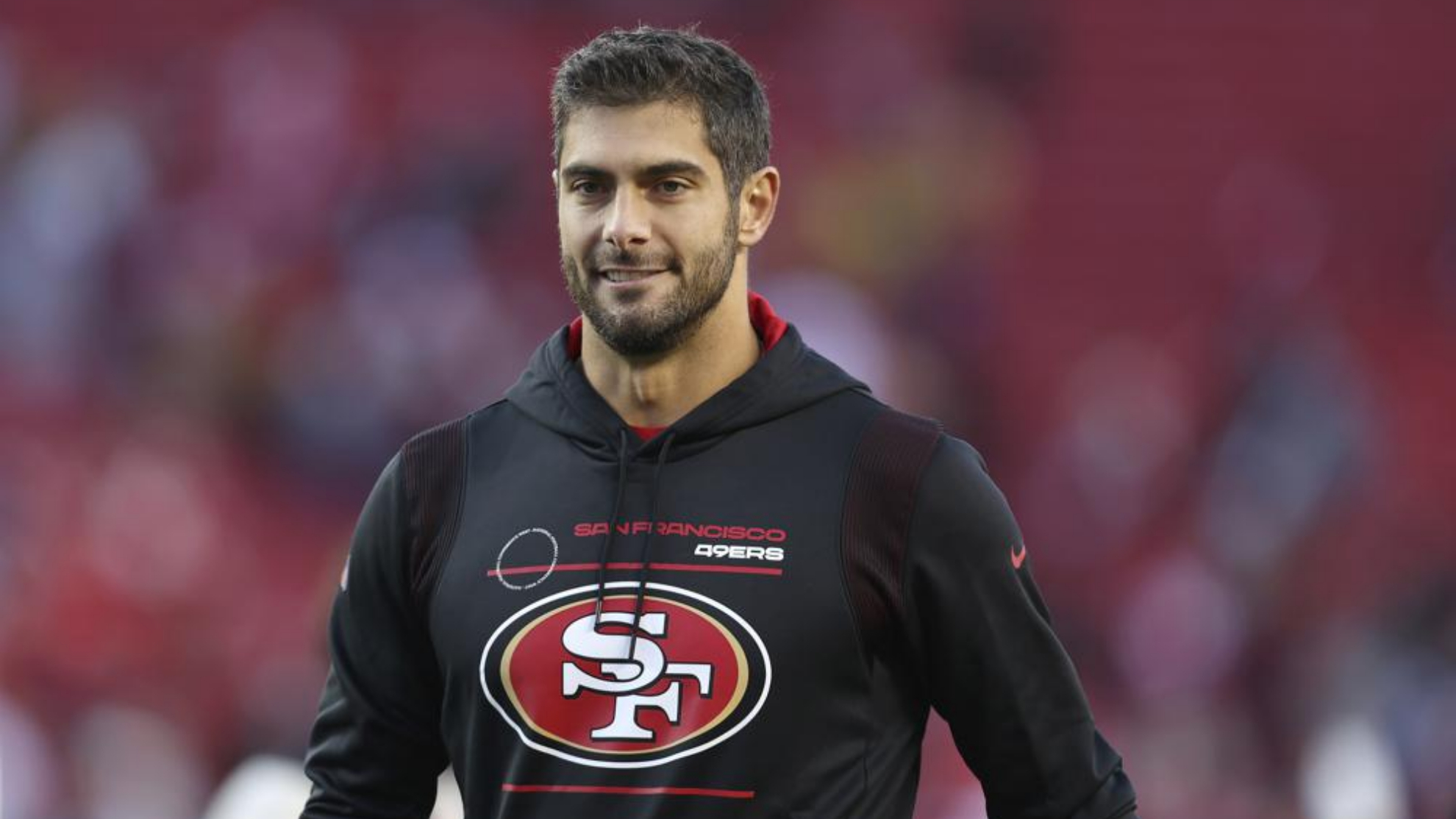 Jimmy Garoppolo walks off the field after the 49ers defeated the Houston Texans.
