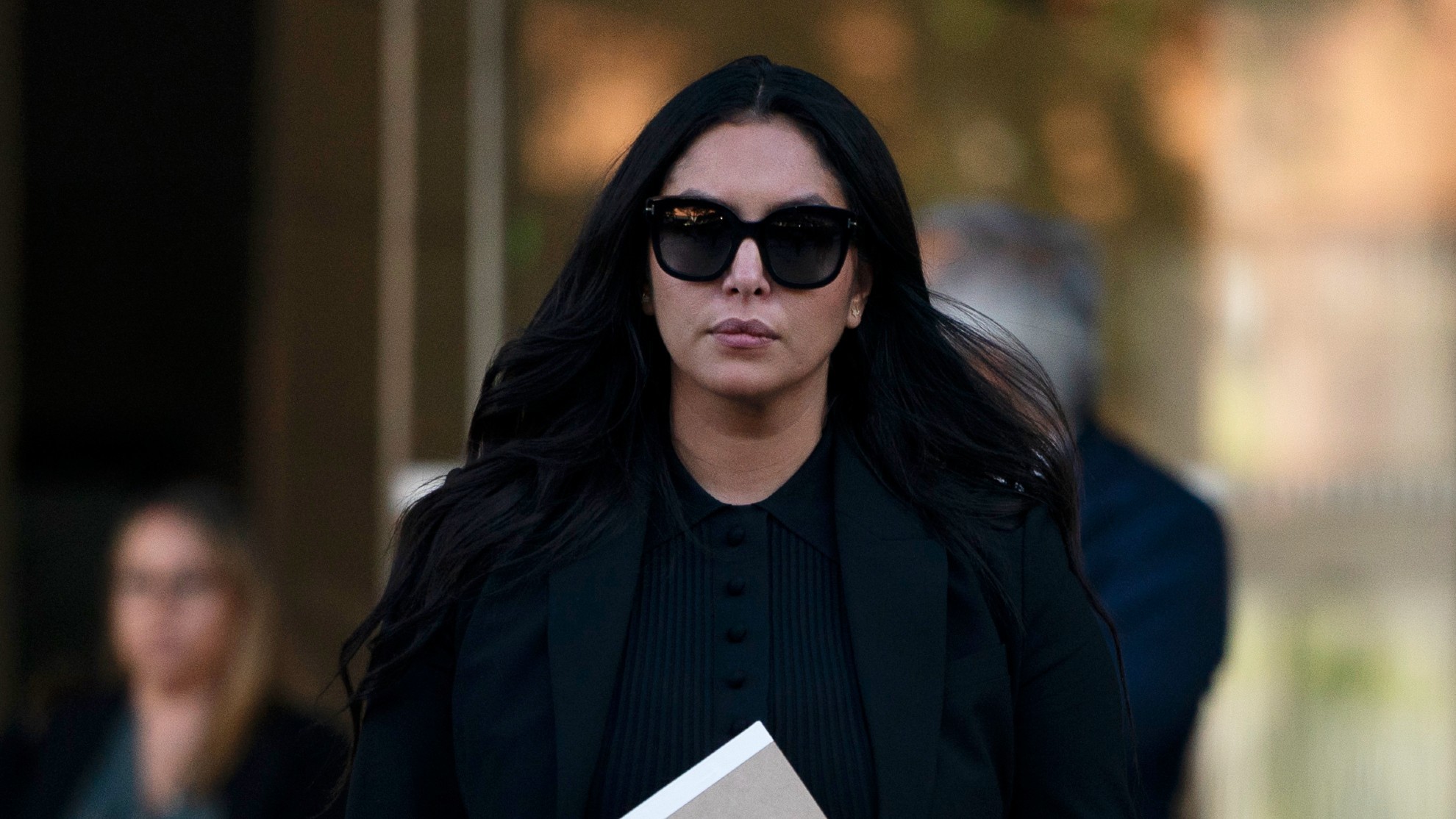 Vanessa Bryant, the widow of Kobe Bryant, leaves a federal courthouse in Los Angeles.