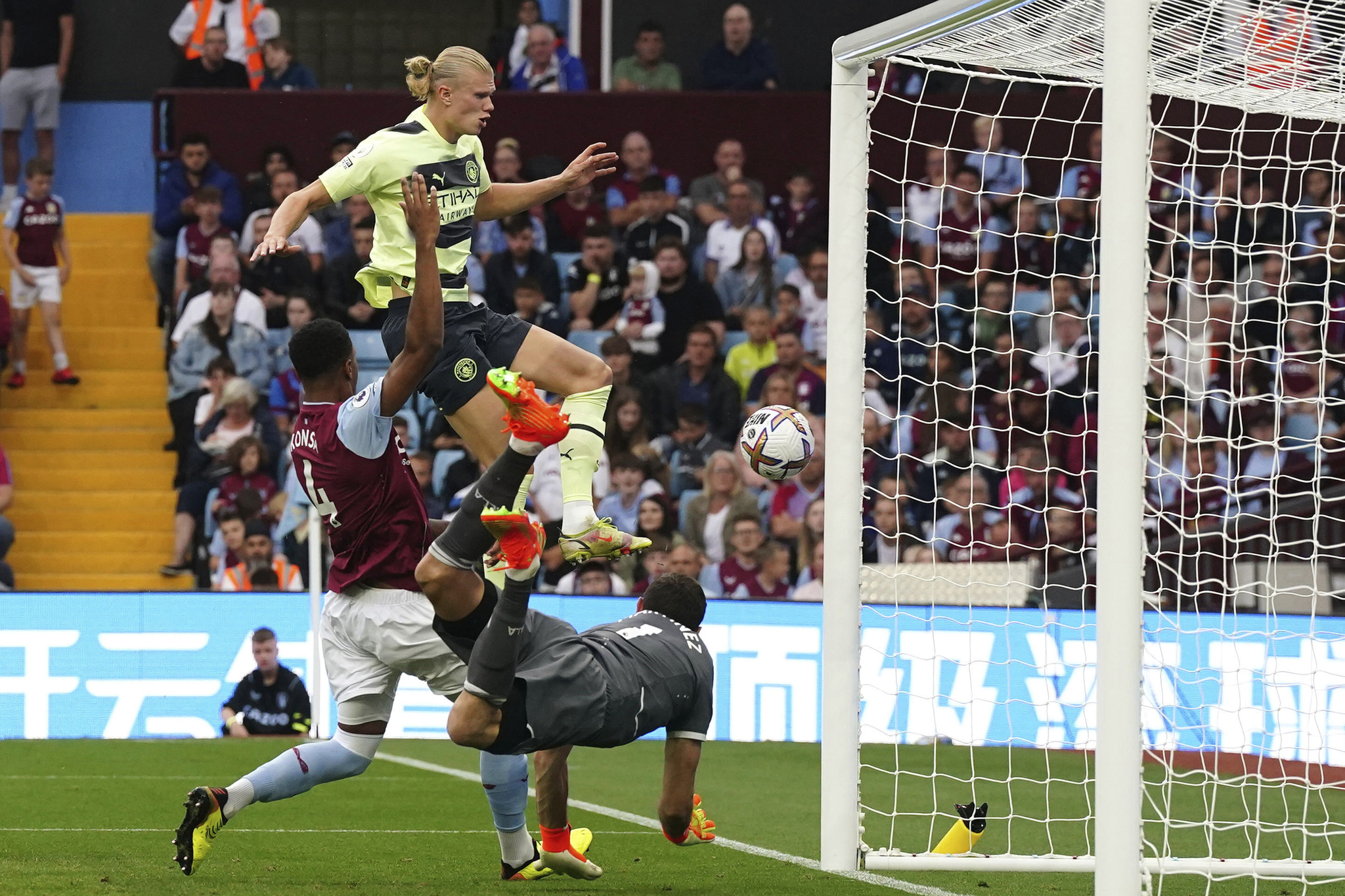 Manchester City's Erling scores his side's opening goal against Aston Villa. (Nick Potts/PA via AP)