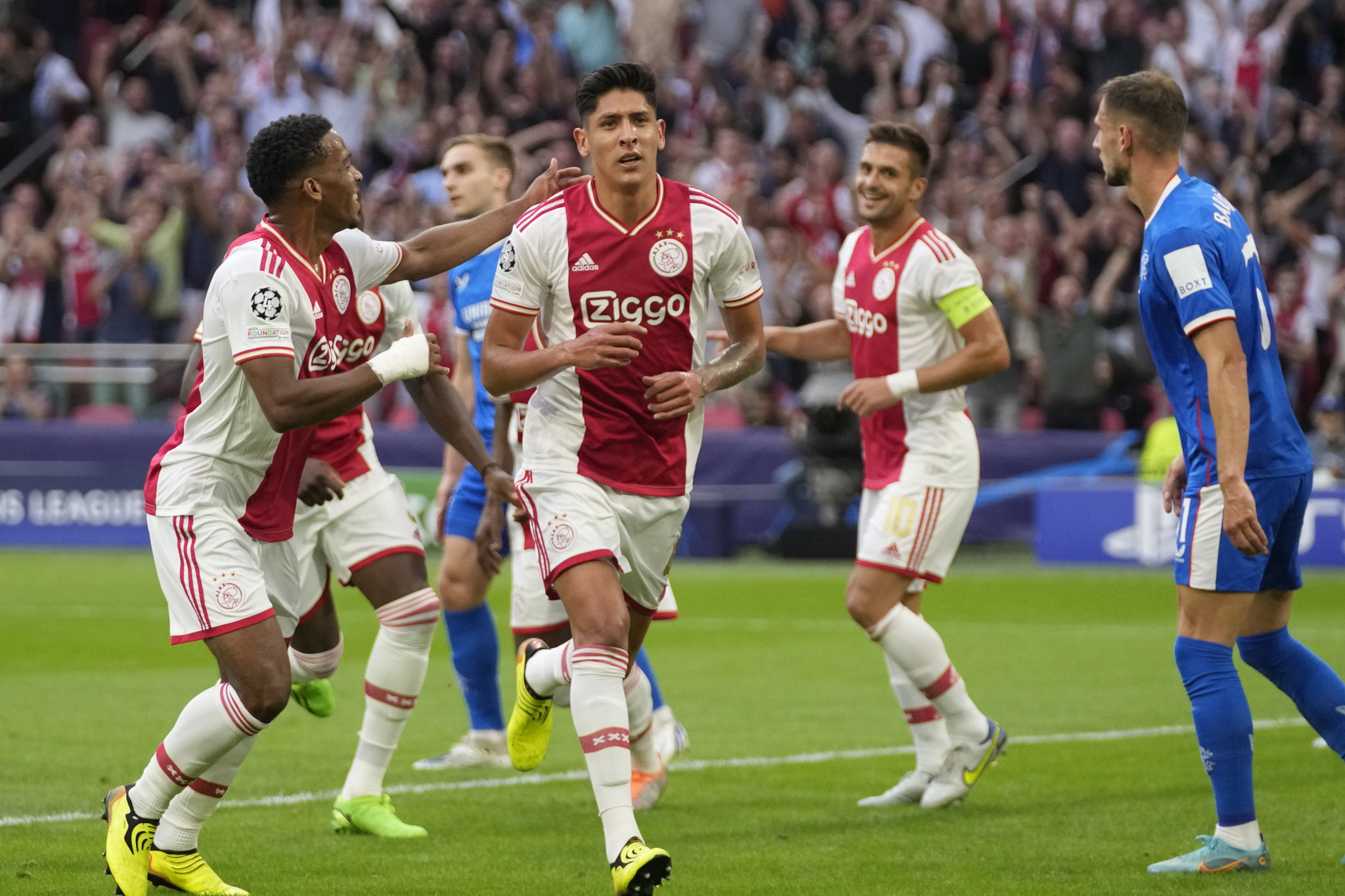  lt;HIT gt;Ajax lt;/HIT gt;'s Edson Alvarez celebrates after scoring his side's first goal during a Champions League group A soccer match between  lt;HIT gt;Ajax lt;/HIT gt; and Rangers at the Johan Cruyff ArenA in Amsterdam, Netherlands, Wednesday Sept. 7, 2022. (AP Photo/Peter Dejong)