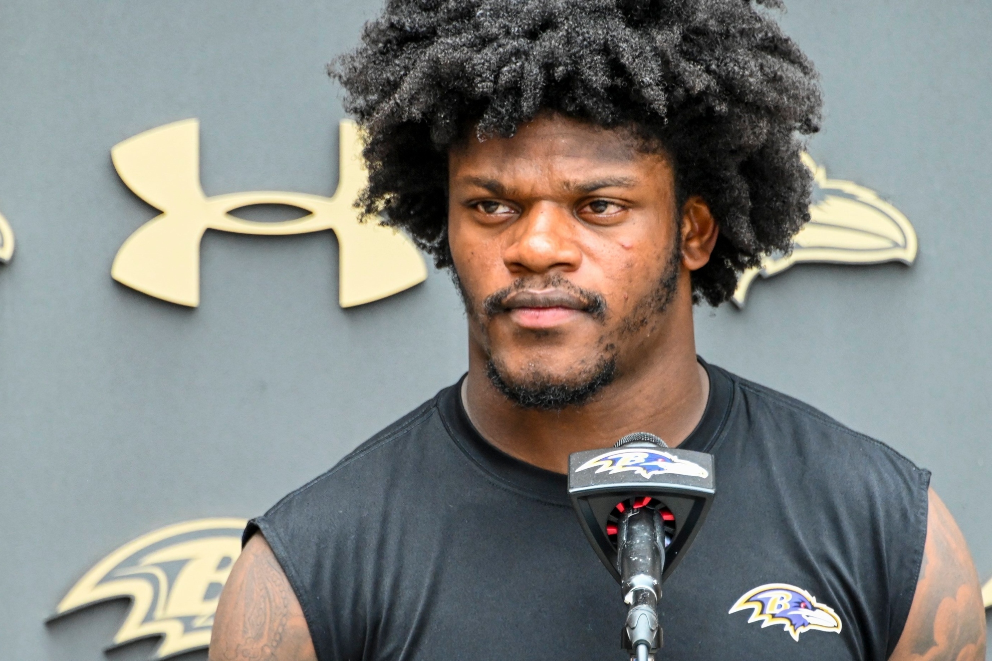 Baltimore Ravens' quarterback Lamar Jackson answers questions after practice  (Kevin Richardson/The Baltimore Sun via AP)