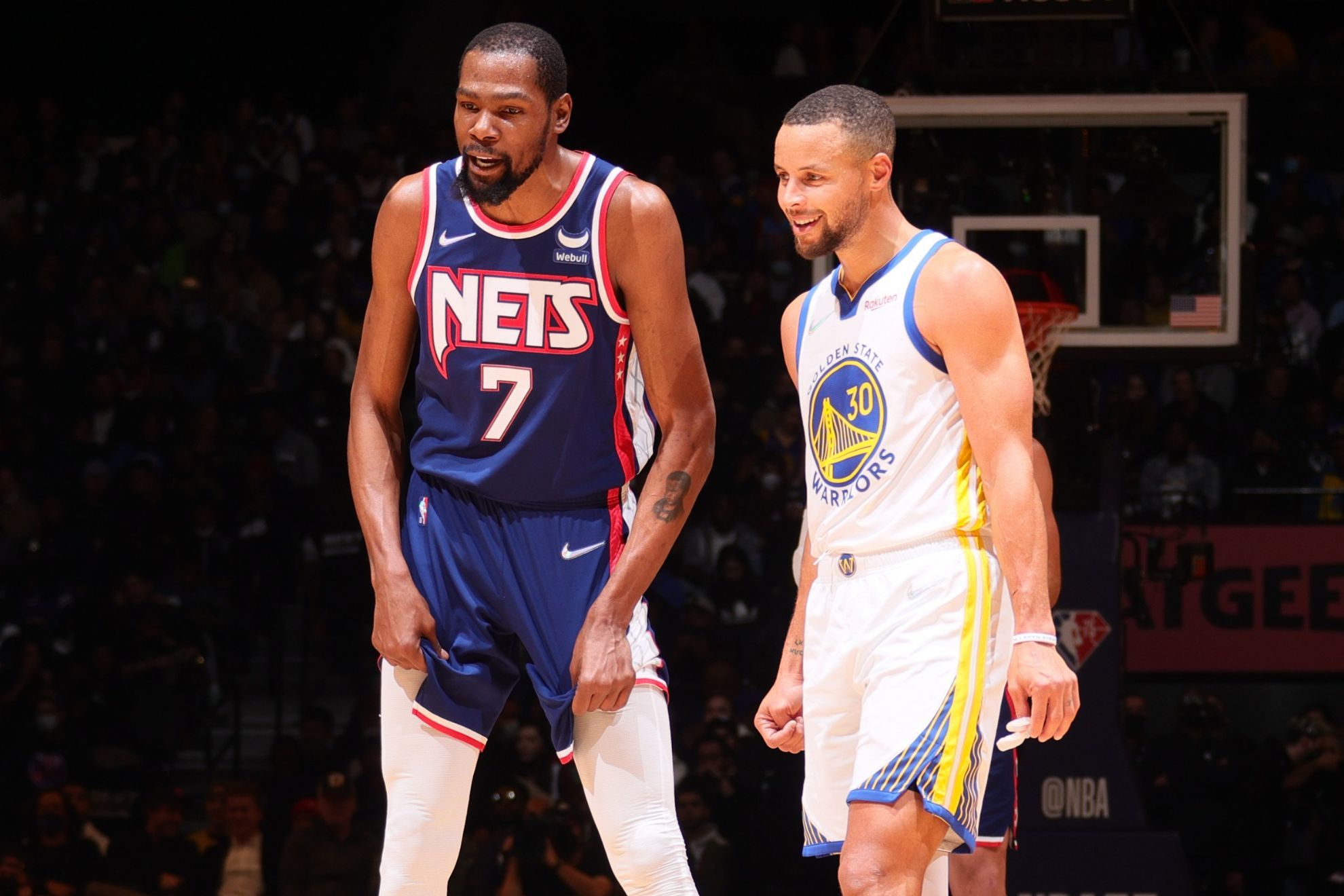 Kevin Durant (Brooklyn Nets) and Steph Curry (Warriors) face off during an NBA game. - AP