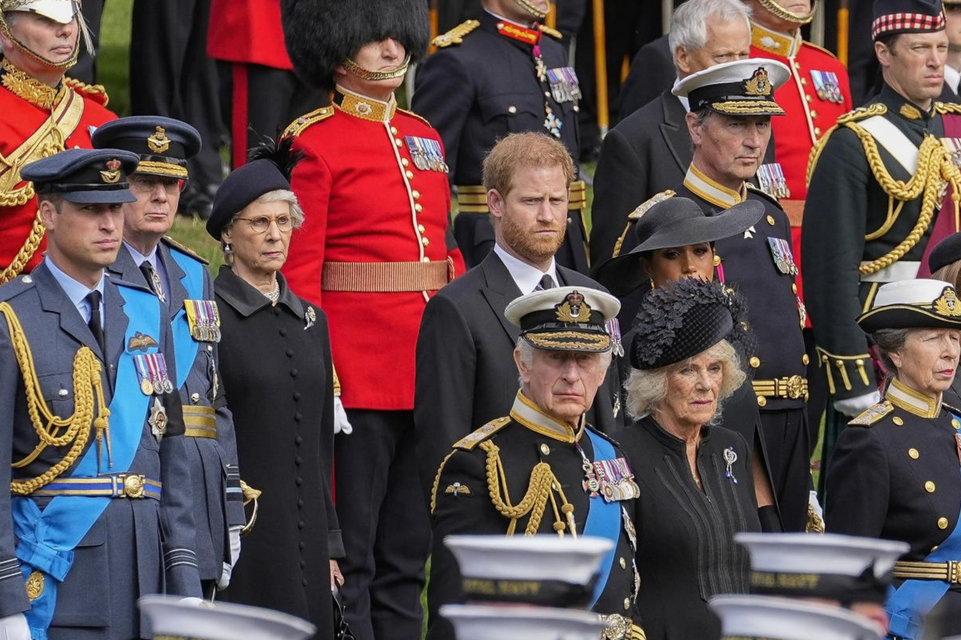 Prince Harry behind his father, King Charles III. - AP Photo/Martin Meissner, Pool