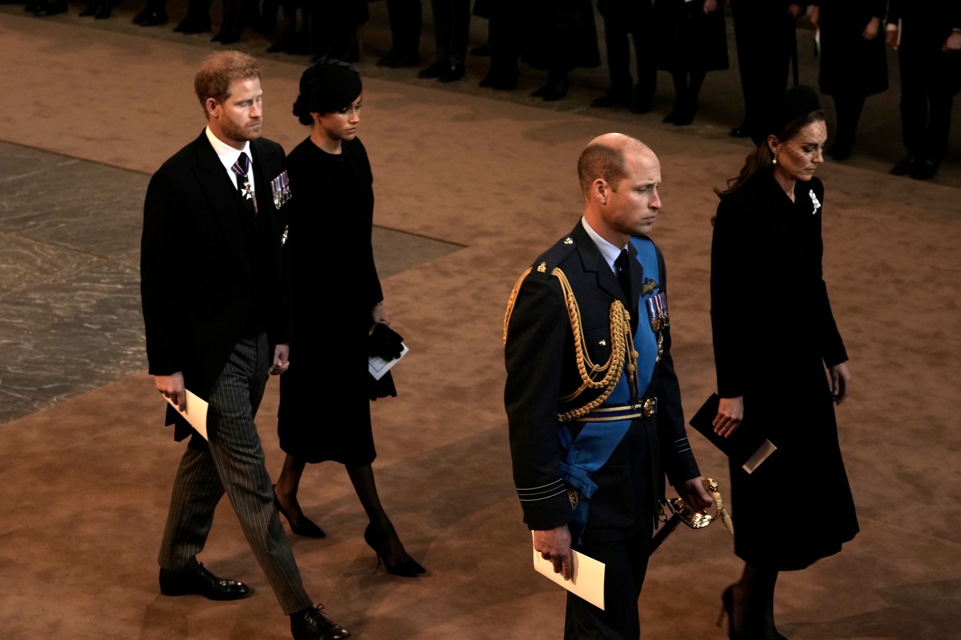 Prince Harry and Meghan, left, Duchess of Sussex, Prince William, second right, and Kate, Princess of Wales leave Westminster Hall in London, Wednesday, Sept. 14, 2022. Queen Elizabeth II will lie in state in Westminster Hall for four full days before her funeral on Monday, Sept. 19  - AP