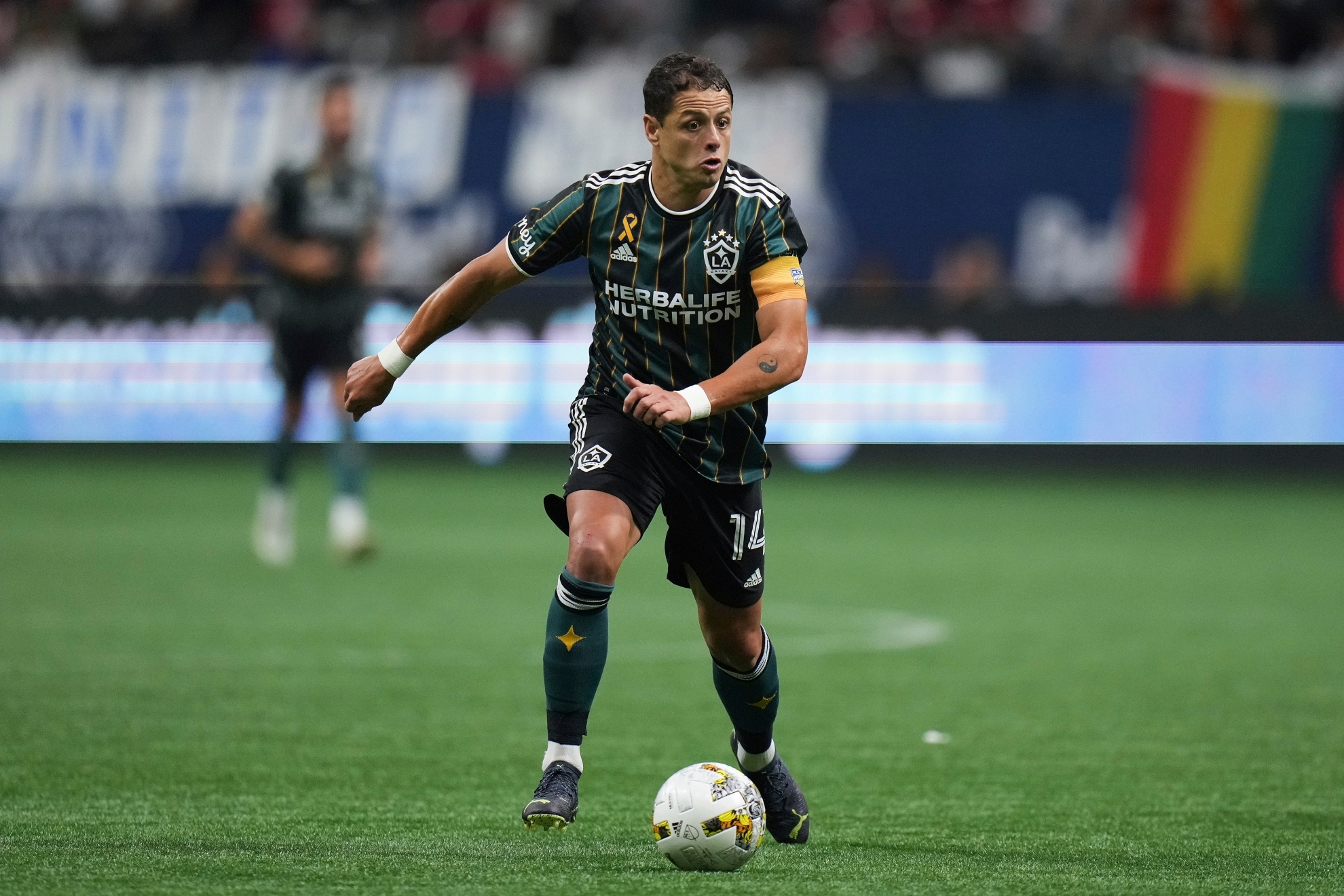LA Galaxy's Javier Hernandez controls the ball during the first half of the team's MLS soccer match against the Vancouver Whitecaps on Wednesday, Sept. 14, 2022, in Vancouver, British Columbia / AP