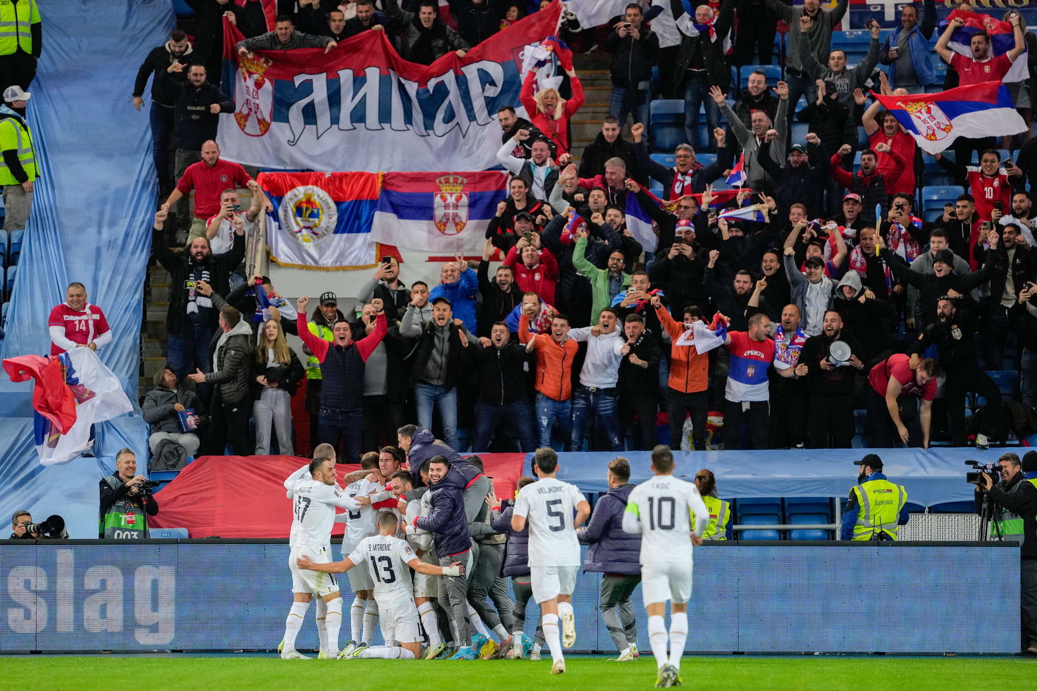 Serbia's players in front of their supporters