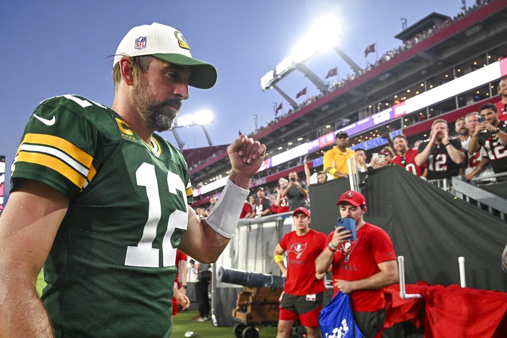 Green Bay Packers' Aaron Rodgers reacts as he walks off the field on Week 3. -AP