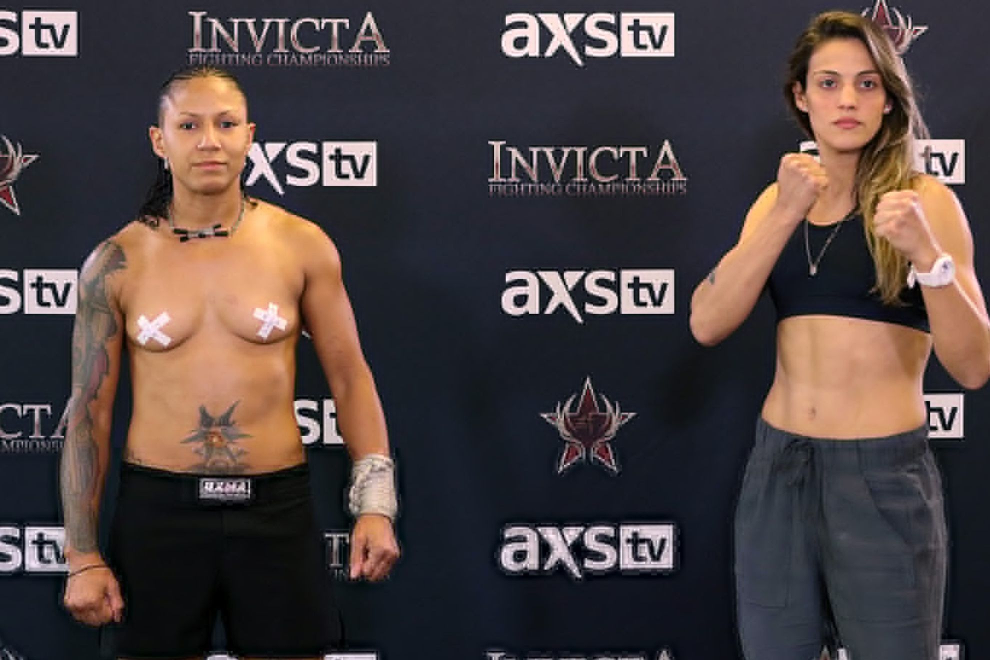Helen Peralta stages her topless protest at Invicta 49 next to her rival, Brazilian Poliana Botelho. -INVICTA