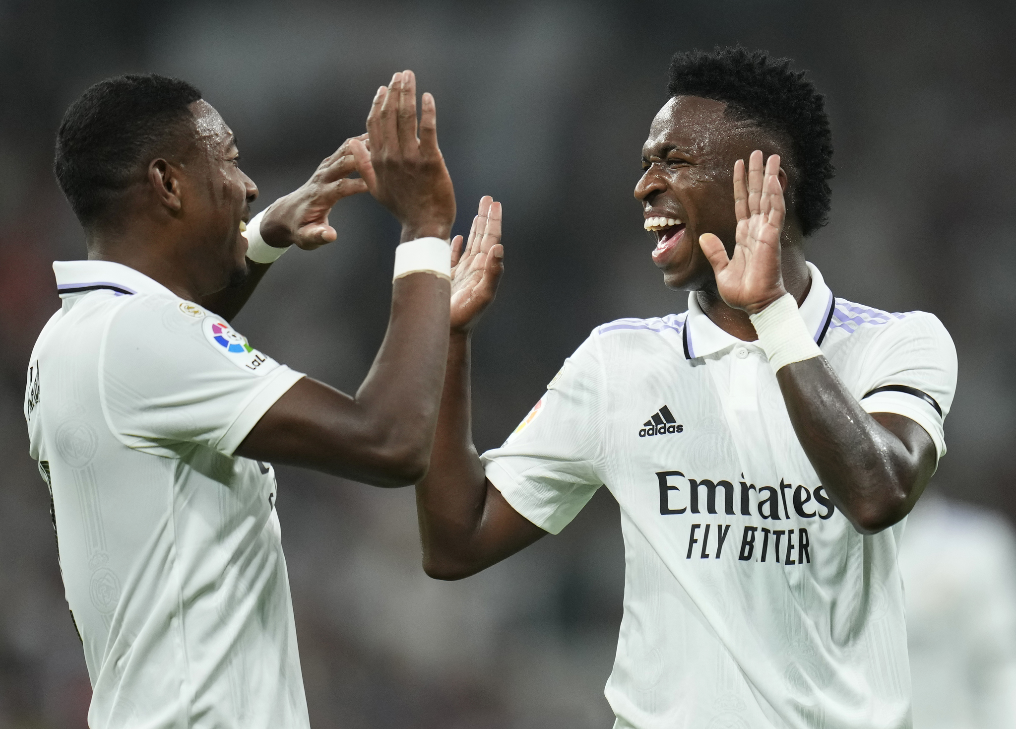 Vinicius Junior, right, celebrates after scoring his side's opening goal 