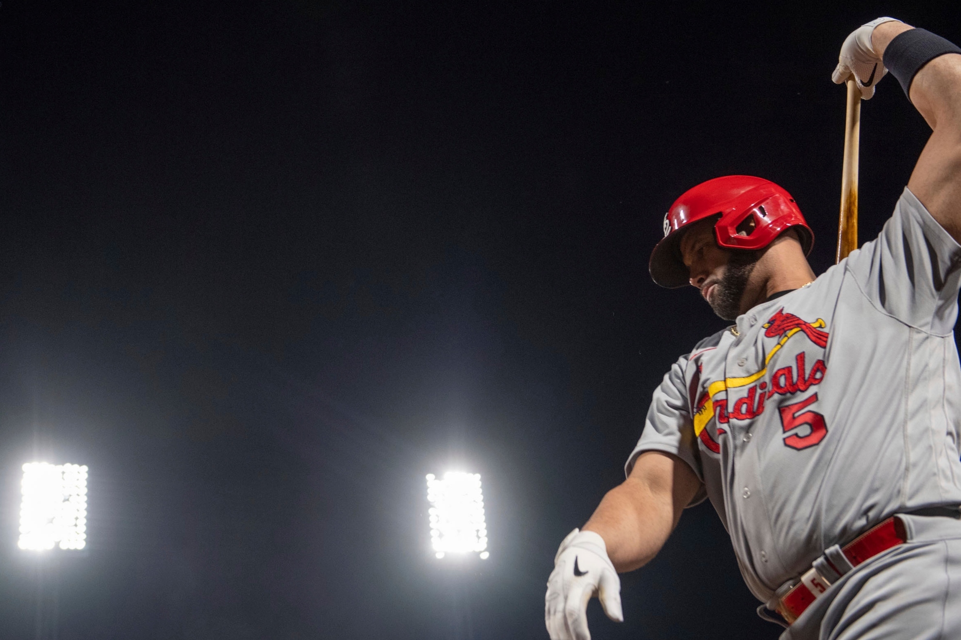 The Cardinals' Albert Pujols warms up before stepping up to the plate on Monday, Oct. 3, 2022, at a baseball game against the Pittsburgh Pirates in Pittsburgh. / AP