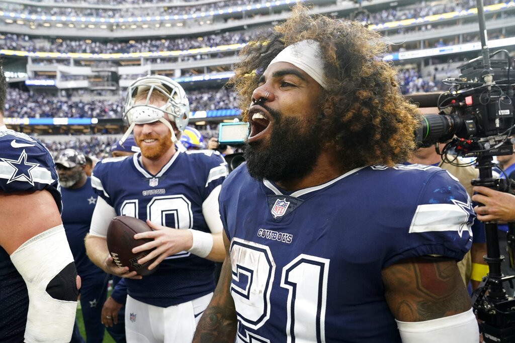 QB Cooper Rush and RB Zeke Elliott celebrate after their victory at SoFi Stadium in Los Angeles. -AP