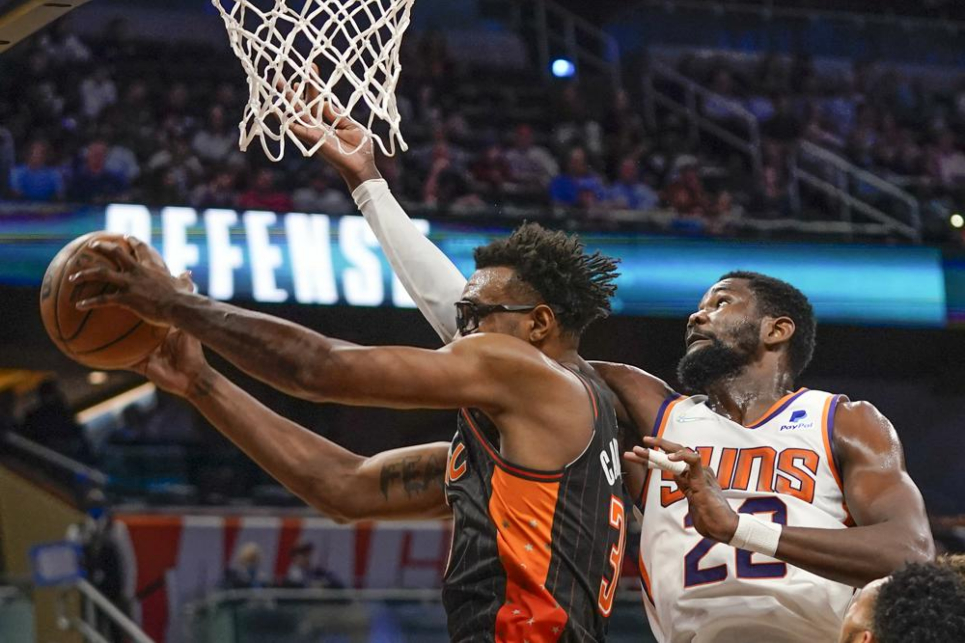 DeAndre Ayton defending for the Phoenix Suns. - AP Photo/John Raoux
