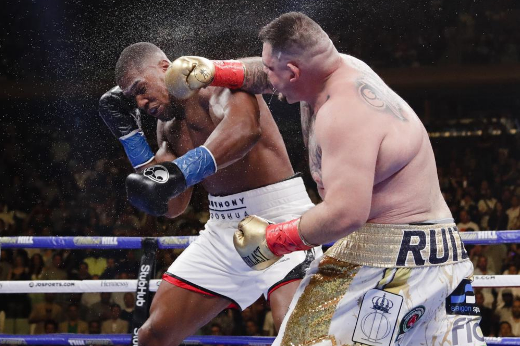 Andy Ruiz Jr. punches Anthony Joshua during a heavyweight championship boxing match. AP Photo/Frank Franklin II