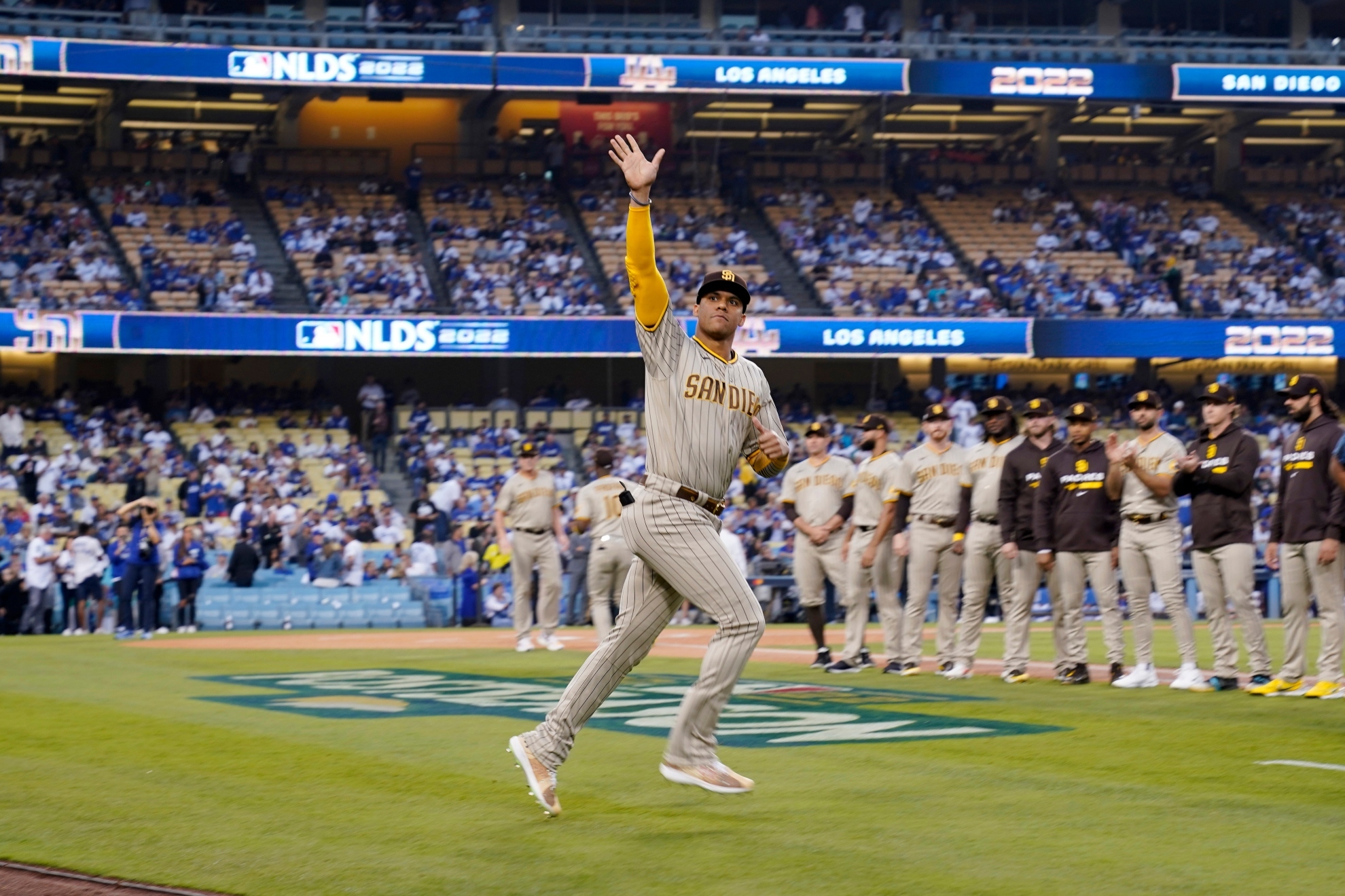 San Diego Padres' Juan Soto waves as he is introduced prior to Game 1 of a baseball NL Division Series against the Los Angeles Dodgers Tuesday, Oct. 11, 2022, in Los Angeles / AP