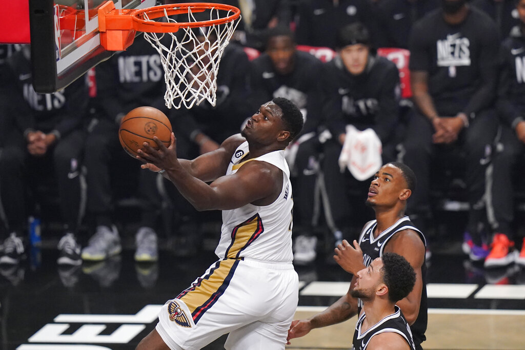 Zion Williamson takes the ball to the hoop in the Pelicans win against the Brooklyn Nets.
