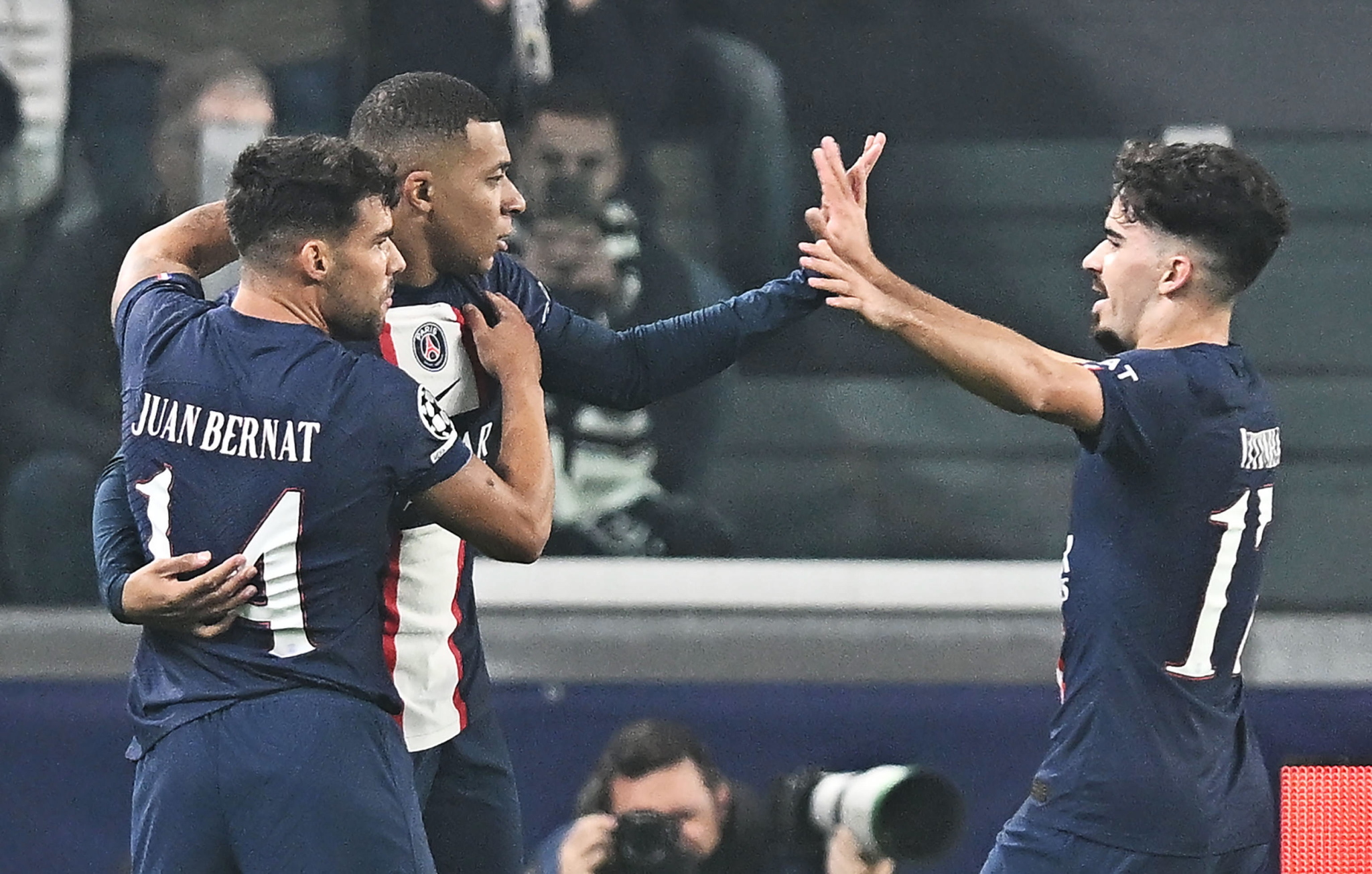 PSG's Kylian Mbappe celebrates with teammates after scoring