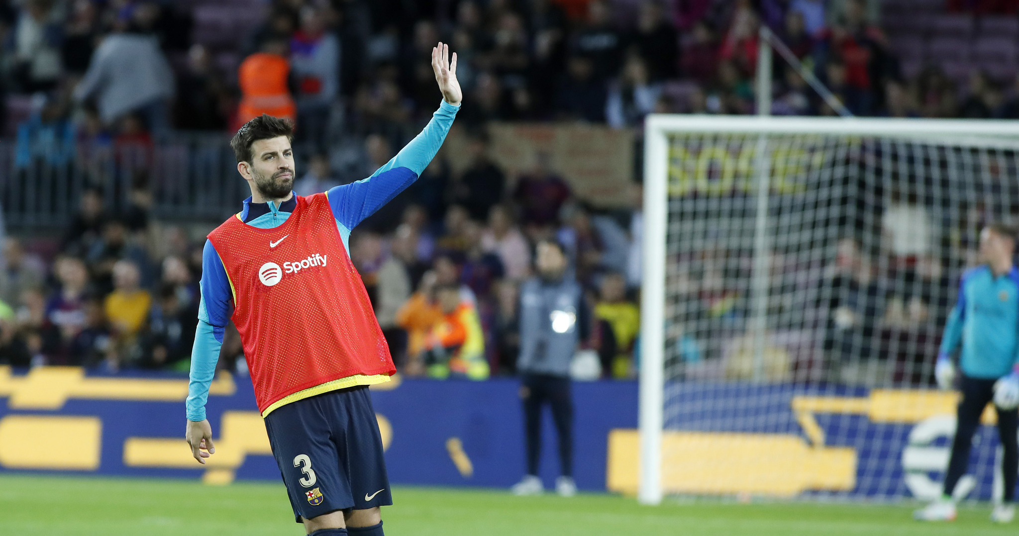 Pique waves to fans 