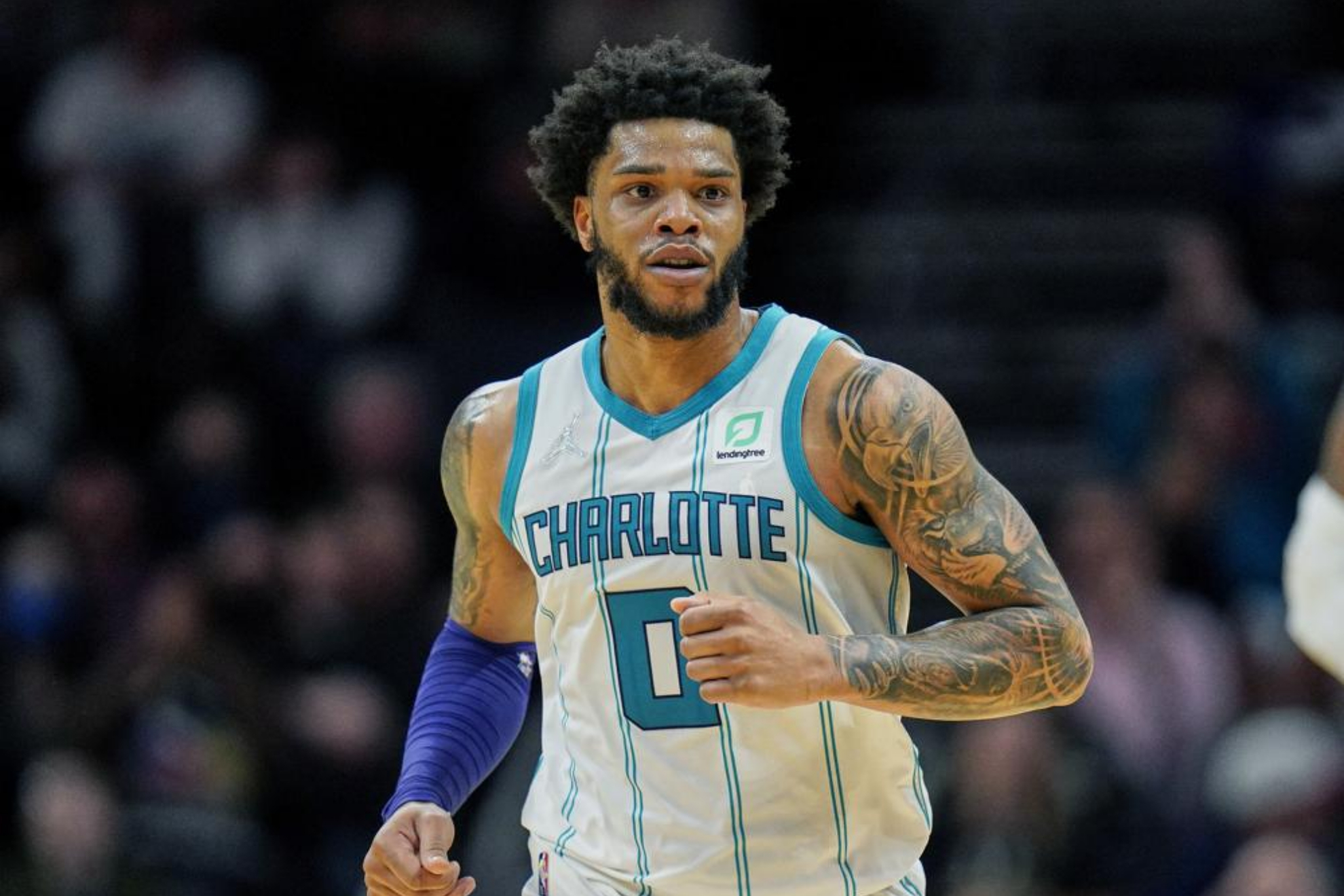 Miles Bridges playing in the NBA for the Charlotte Hornets.