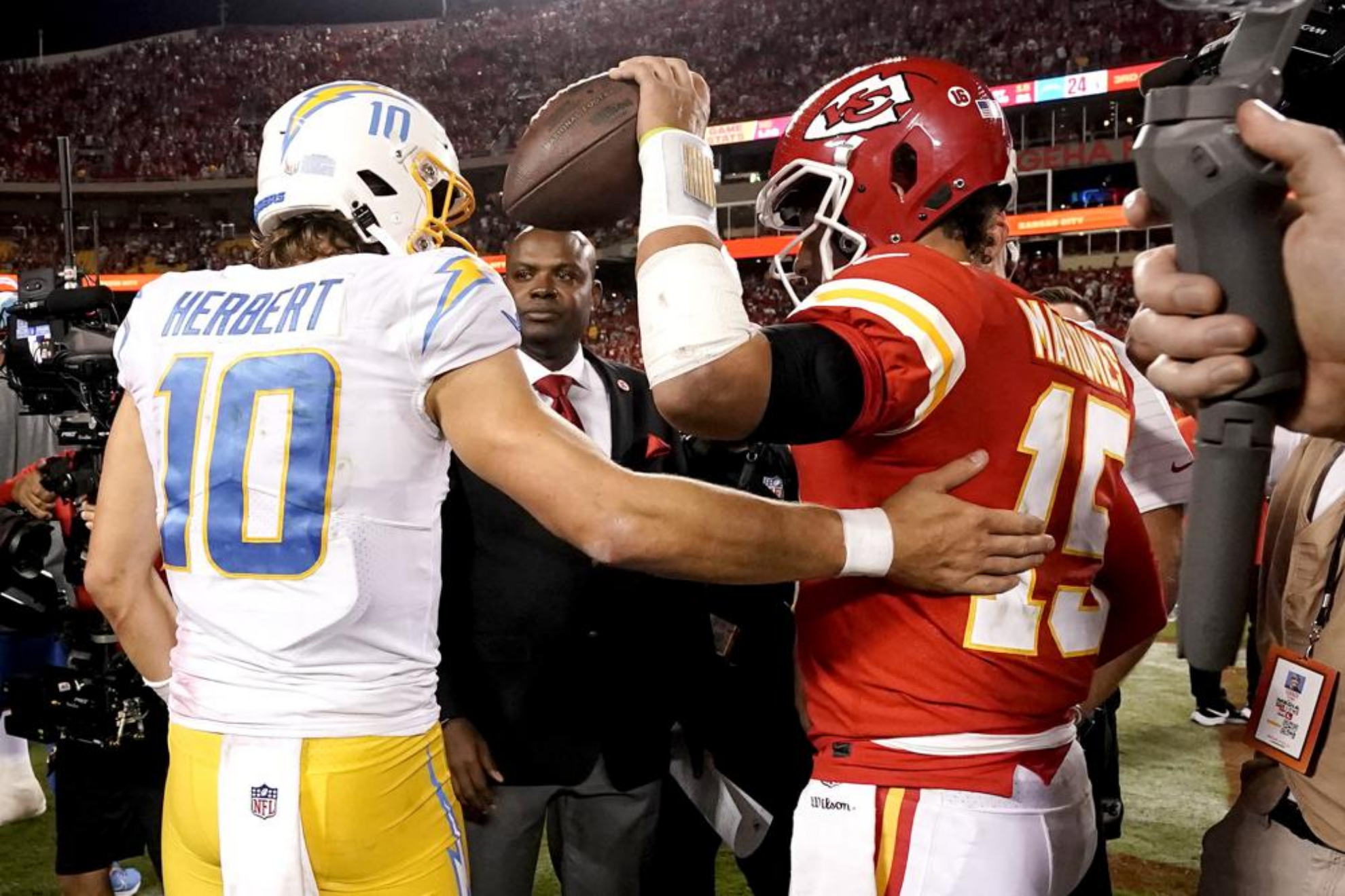 Chiefs quarterback Patrick Mahomes greets Chargers quarterback Justin Herbert.