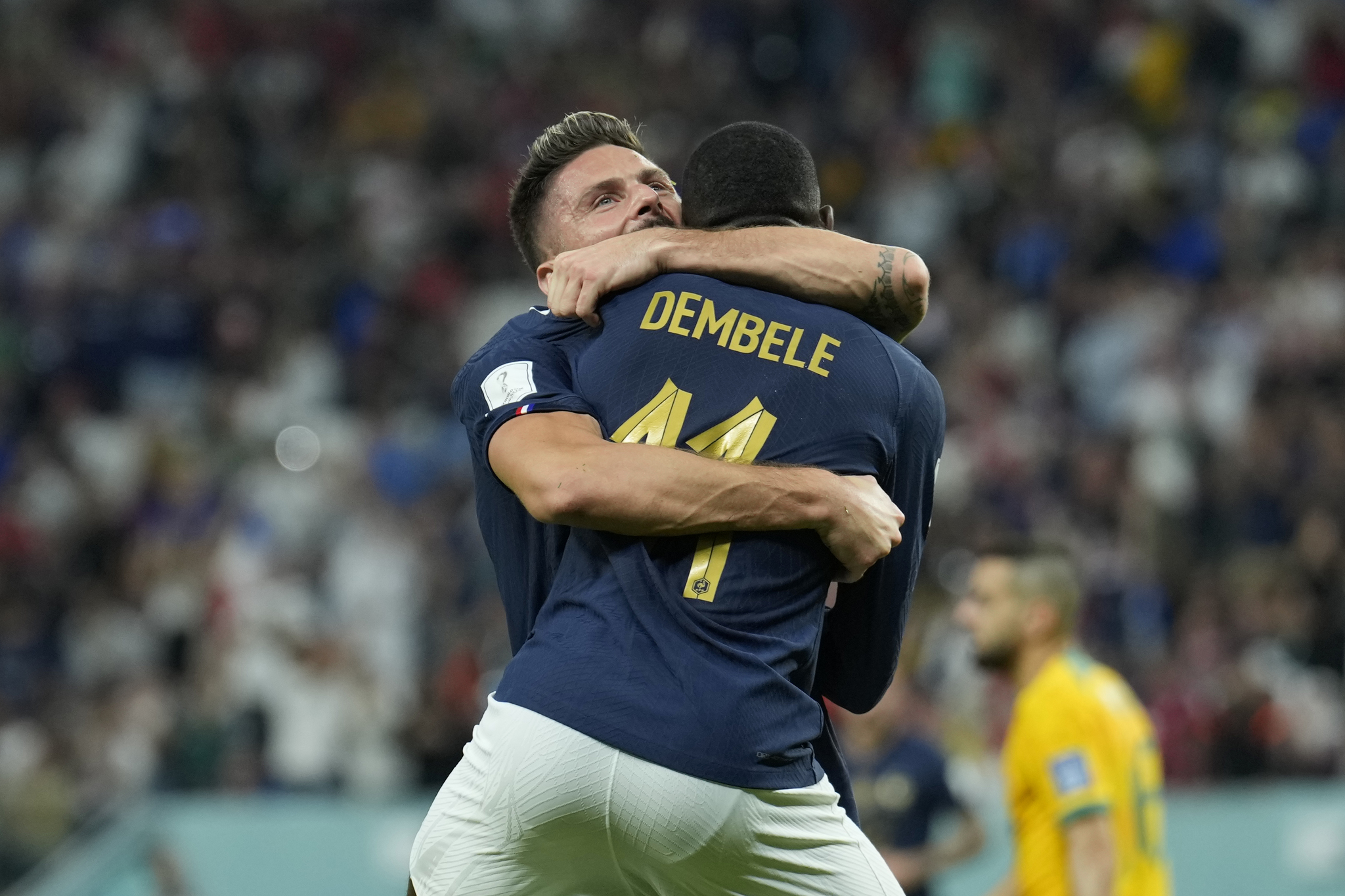 France's Olivier Giroud, left, celebrates with his teammate Ousmane Dembele after scoring his side's second goal during the World Cup group D soccer match between France and  lt;HIT gt;Australia lt;/HIT gt;, at the Al Janoub Stadium in Al Wakrah, Qatar, Tuesday, Nov. 22, 2022. (AP Photo/Francisco Seco)